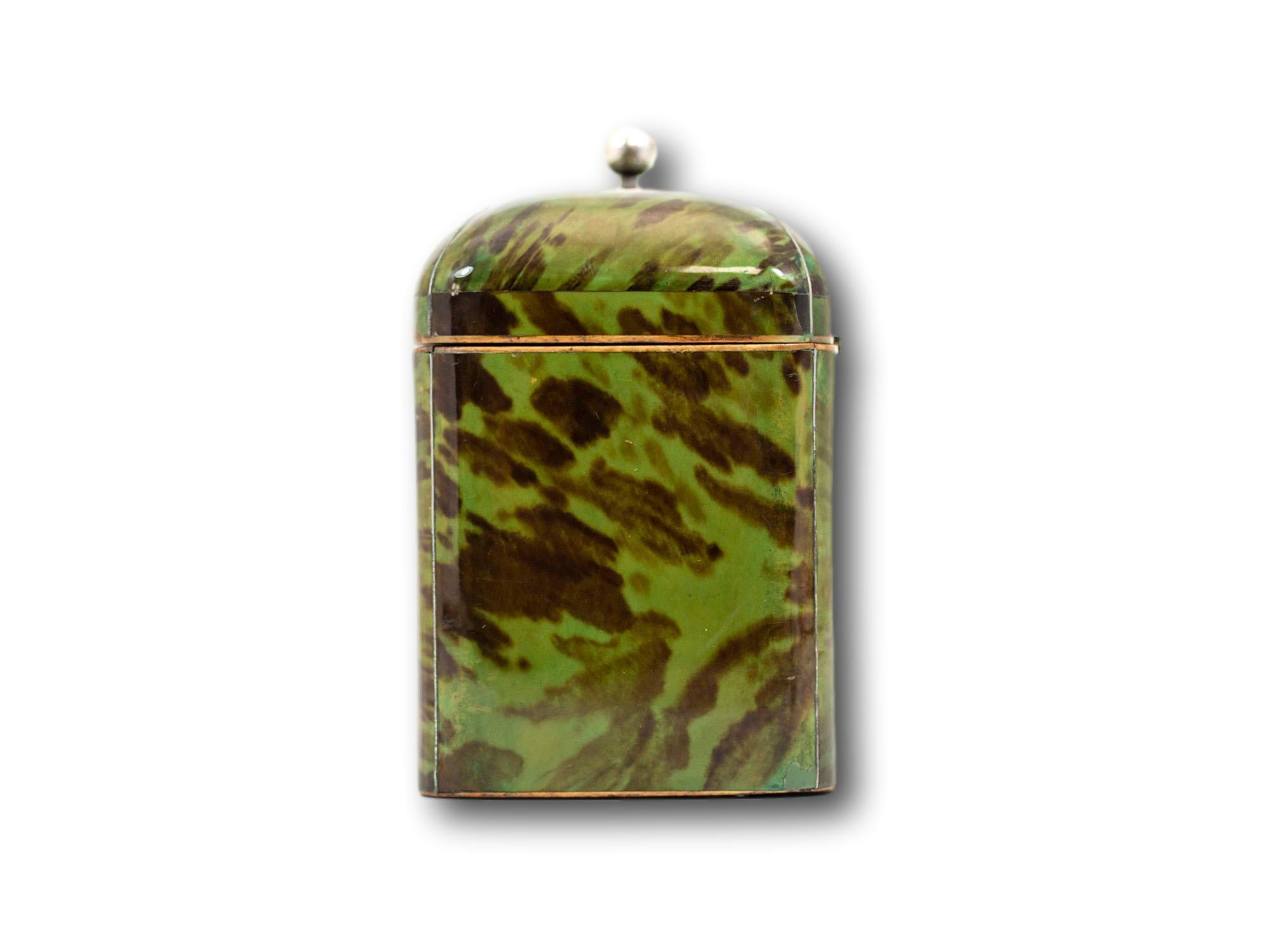 From our tea caddy collection, we are delighted to offer this charming dome-topped rectangular green tortoiseshell tea caddy. The tea caddy is finished in vibrant green tortoiseshell to the exterior with silver stringing to the extremities. The lid