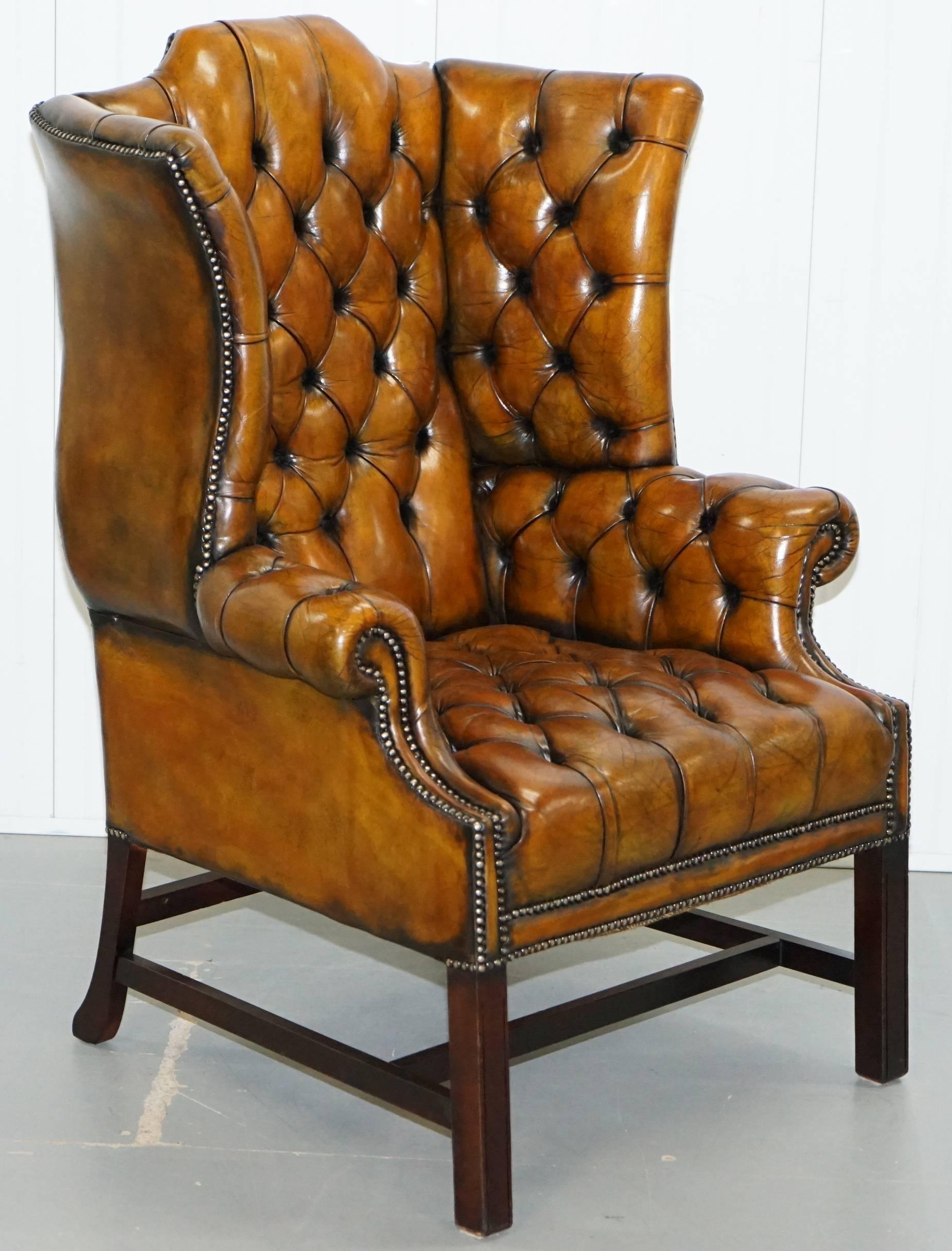 We are delighted to offer for sale lovely antique Georgian style vintage wingback armchair in fully restored condition

A very good looking and decorative wingback armchair with the Georgian H framed base. Its called a H-frame because if you lay
