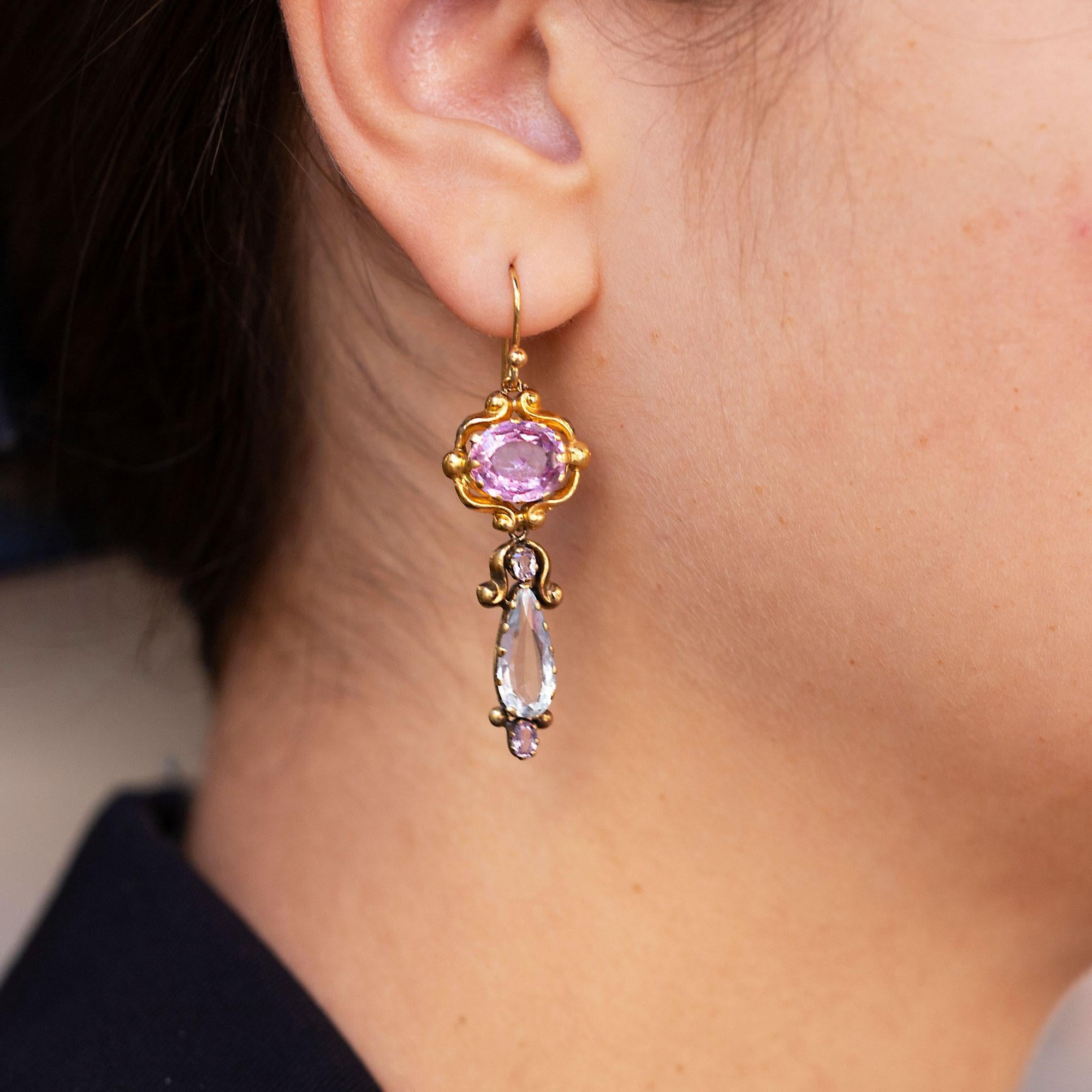 Don't miss out on this romantic pair of true Georgian era drop earrings, the perfect flourish to your jewelry estate, hand-crafted circa early 1800s. Crowned with richly colored, rare natural pink Imperial Topaz, totaling 4.85 carats and lovingly