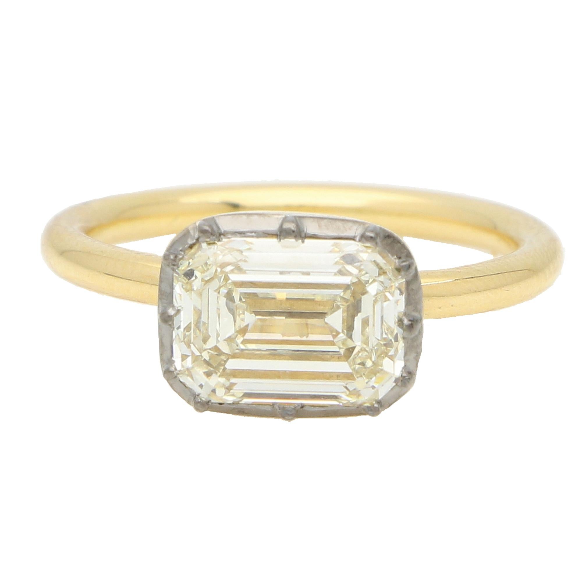A sparkly Georgian inspired 2.40ct emerald cut East-West diamond solitaire ring set in 18k gold. 

The ring is solely set with a 2.40 carat emerald cut diamond which is set in a elegant Georgian inspired cut down setting. Traditionally, the head of