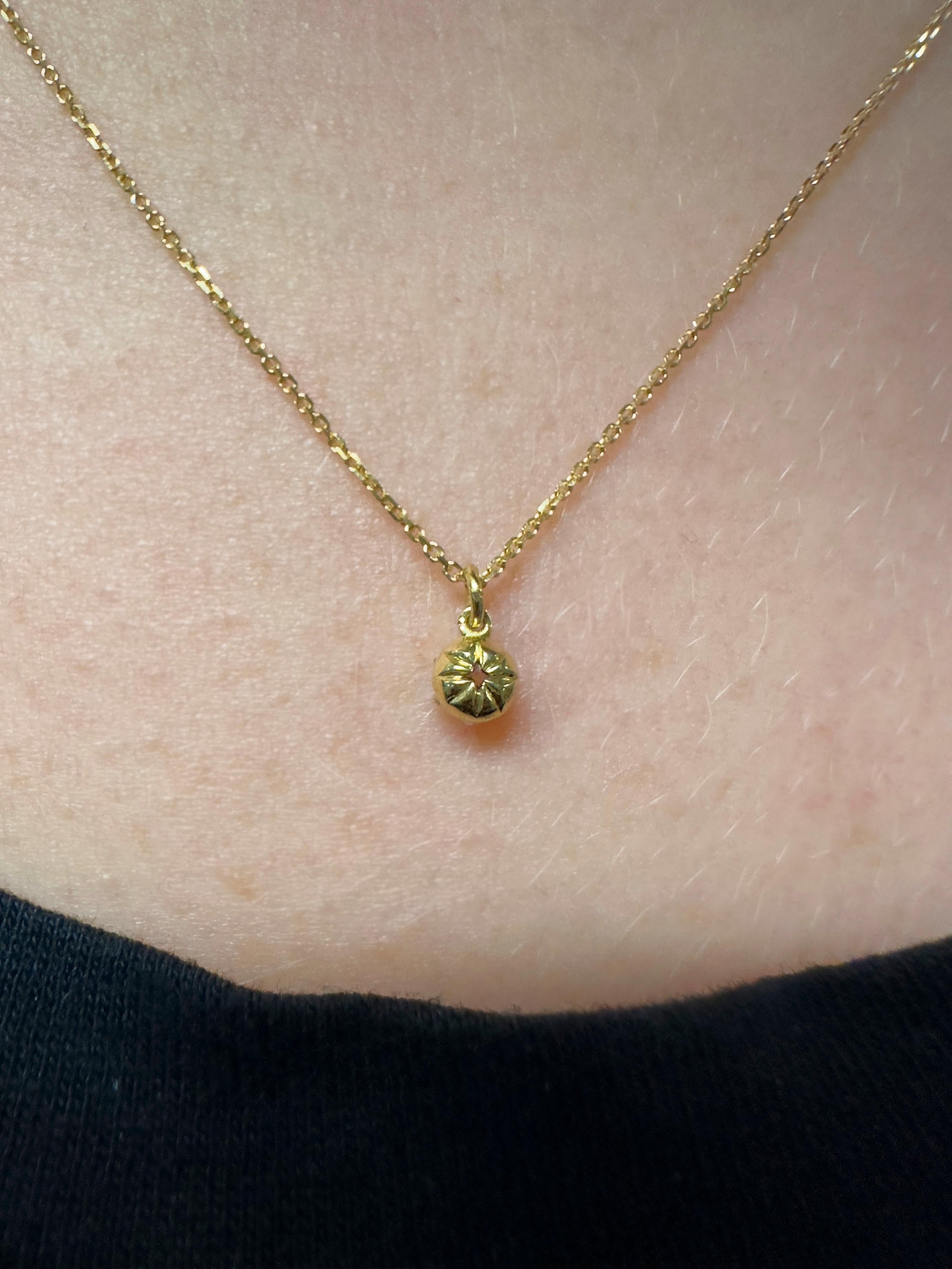 This dainty diamond pendant is a piece you'll never want to take off. Just as lovely on its own as it is layered with other pieces, the delicate diamond cut chain means it feels almost weightless. 

With a gorgeous 'cut-down' setting evocative of