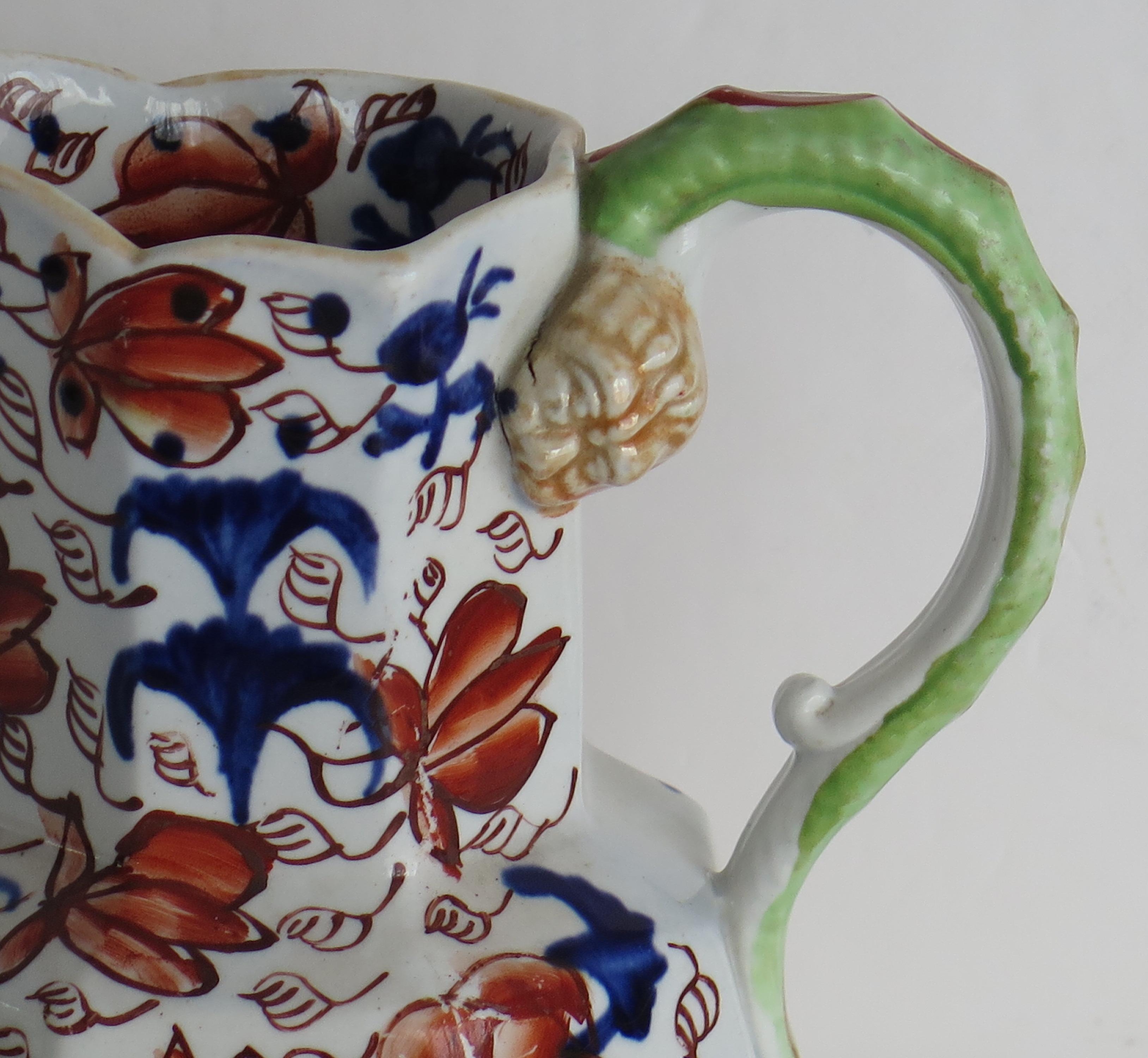 This is a good late Georgian ironstone Hyrda Jug or Pitcher in a Basket Japan pattern, by an English Staffordshire maker, Circa 1820.

The jug is well potted with an octagonal shape with a lovely high loop snake handle.

The Jug has a good