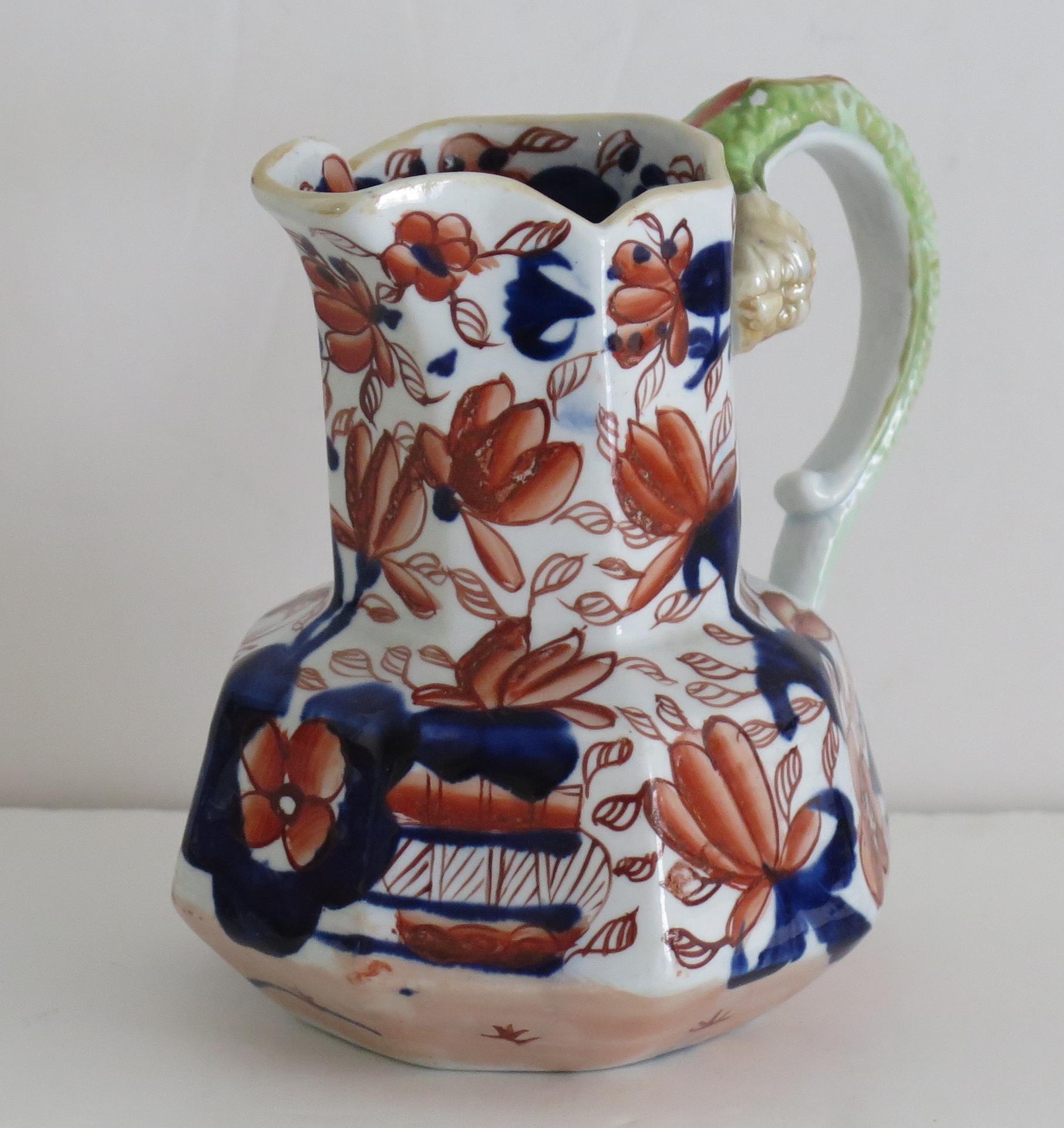 This is a good late Georgian ironstone Hyrda Jug or Pitcher in a Basket Japan pattern, by an English Staffordshire maker, Circa 1820.

The jug is well potted with an octagonal shape with a lovely high loop snake handle.

The Jug has a good