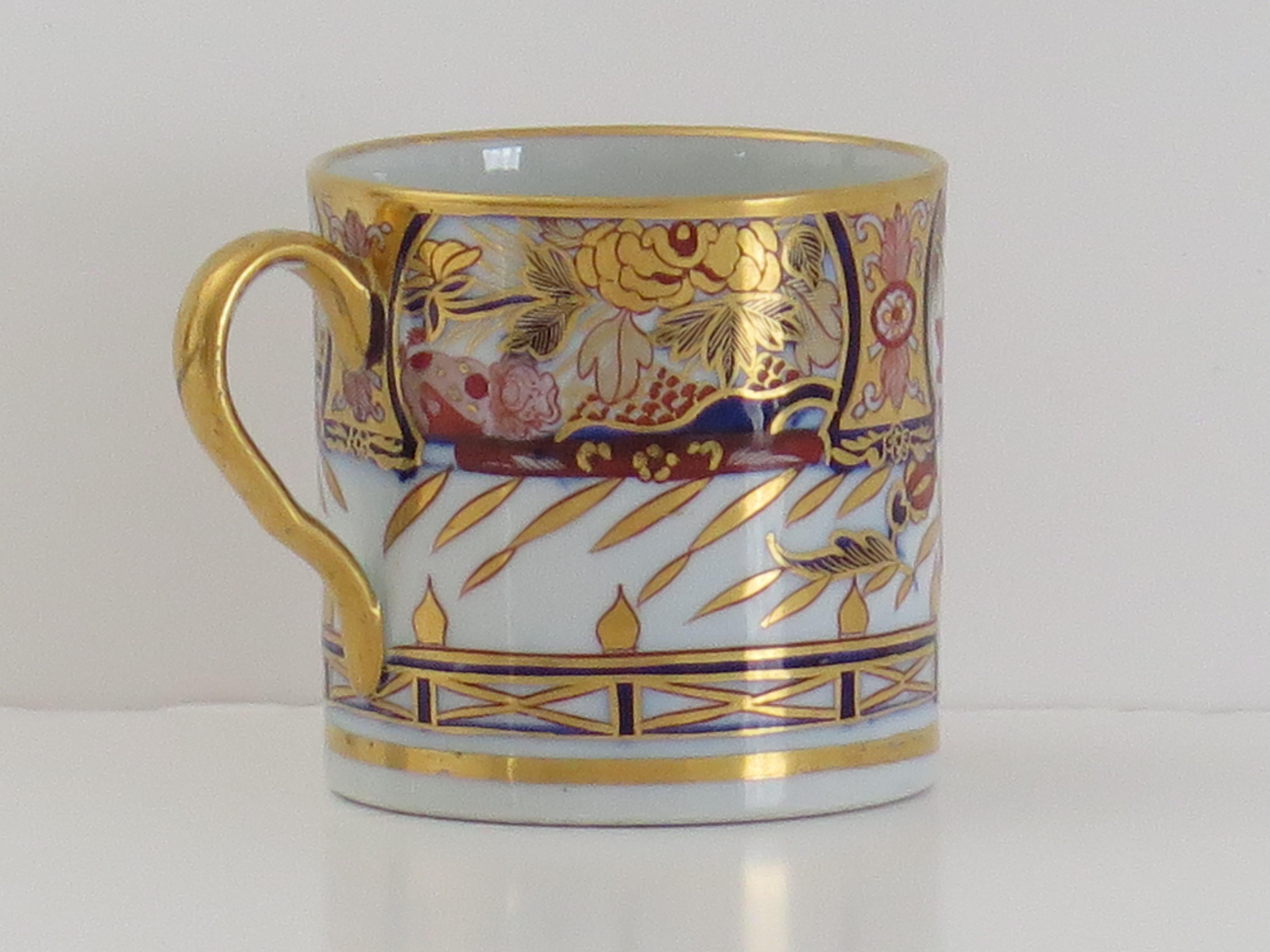 This is a very high quality Coffee Can by the Coalport Porcelain works, Shropshire, England, made during the John Rose period of the late Georgian years, circa 1805.

The coffee can is nominally parallel, tapering slightly to the base, with a simple