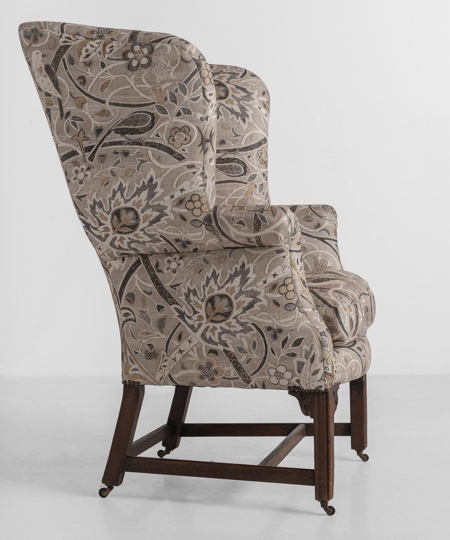 Georgian Linen Wingback Chair, England, circa 1760

George III mahogany wing chair with serpentine seat rail, newly upholstered in linen Morris & Co. fabric.