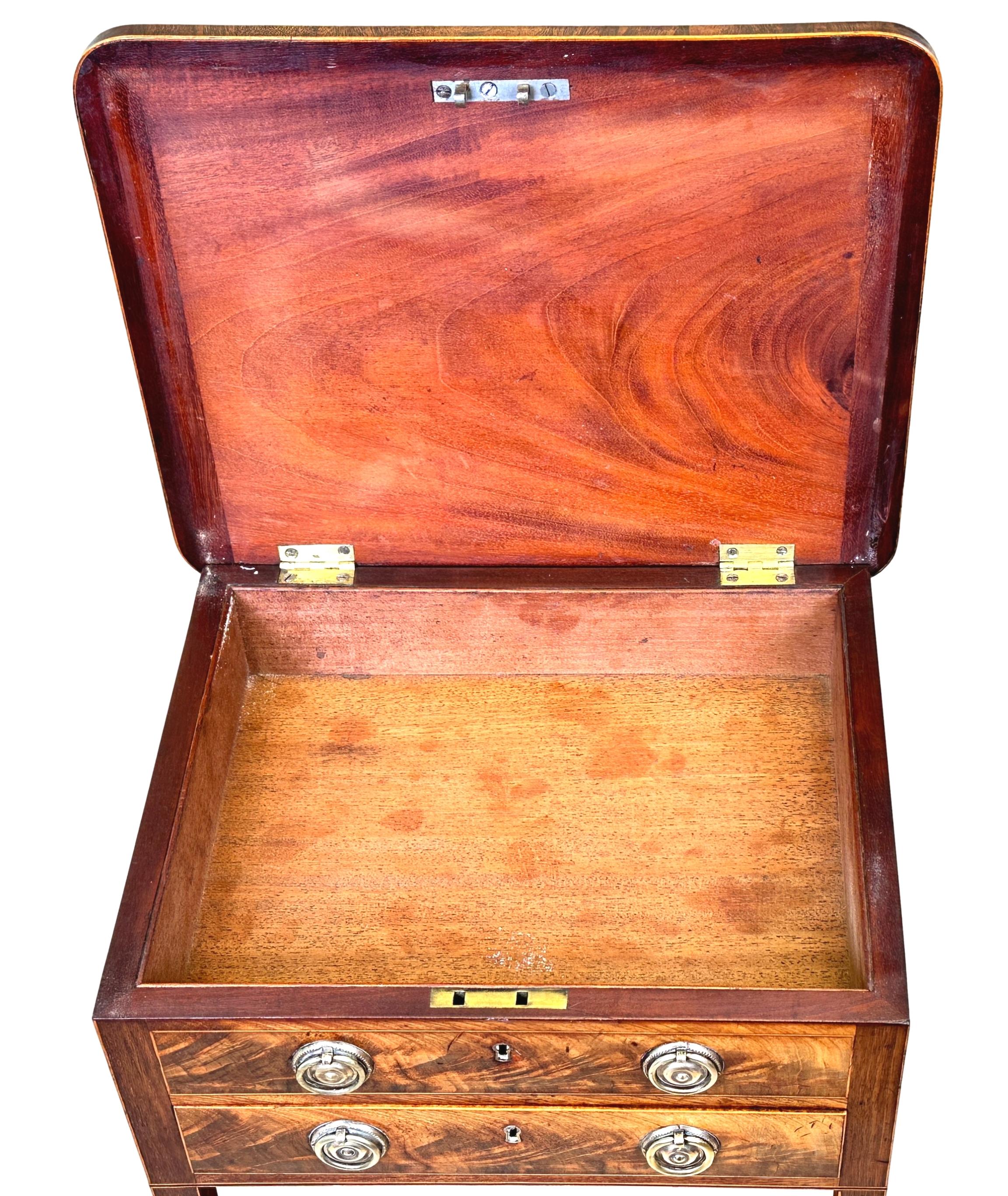 A Fine Quality Late 18th Century, Georgian, Sheraton Period, Mahogany Occasional Lamp Table, Having Rectangular Hinged Lift Up Lid Enclosing Storage Compartment, Over One False Drawer And One Actual Drawer With Fitted Divisions, Raised On Elegant