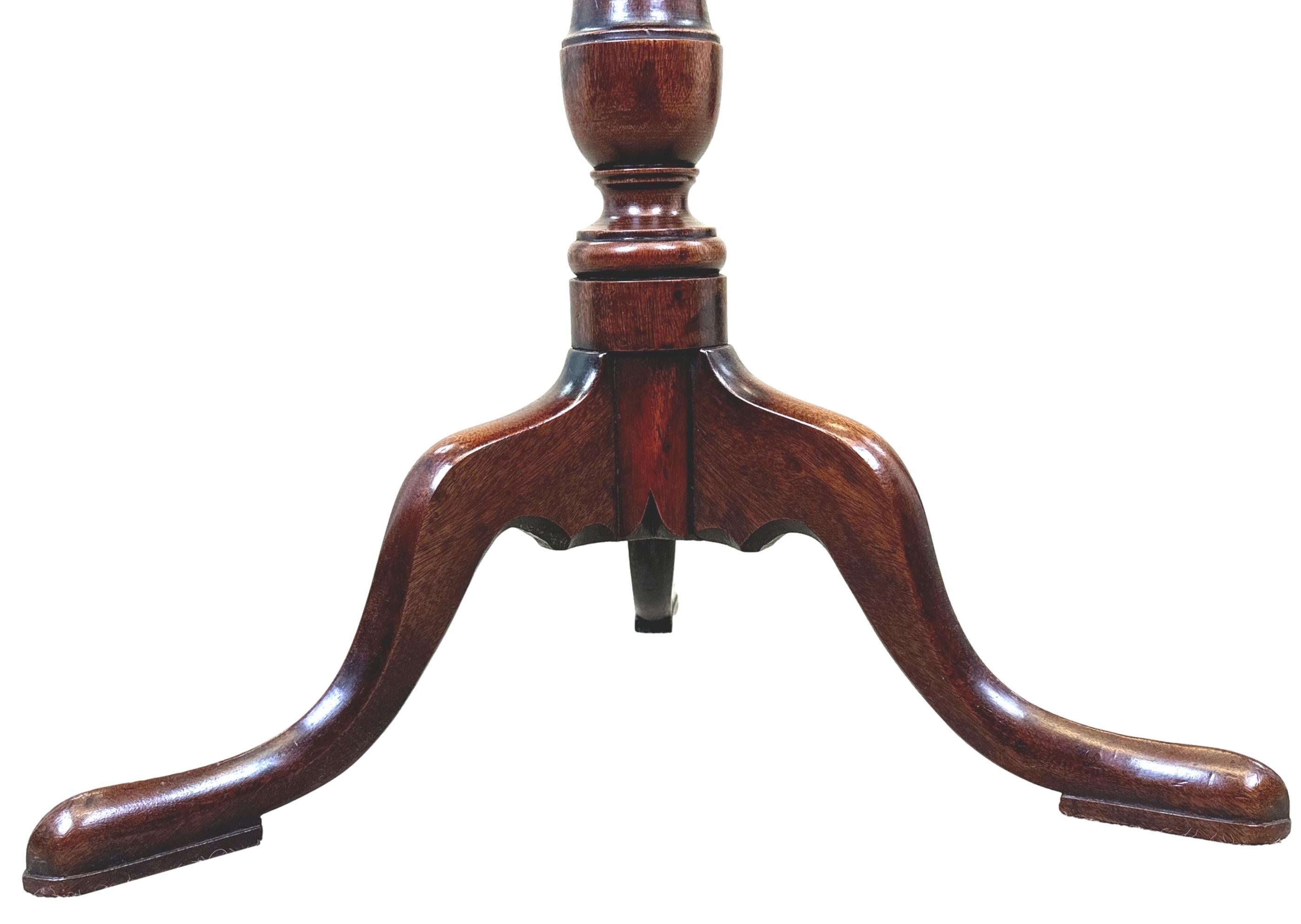An Extremely Charming 18th Century, Georgian, Mahogany Wine Table, Or Candle Stand, Having Superbly Figured Top With Elegant Wavy Galleried Edge, Raised On Turned Central Column With Splayed Tripod Legs.

Circa 1750.

Height 28in.
Width 13in.
Depth