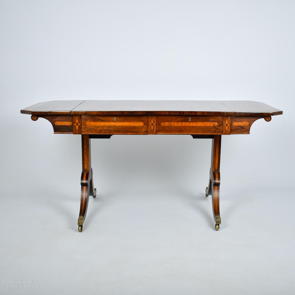 Rosewood and inlaid and bordered with satinwood Georgian sofa table circa 1780. The quality of this table sets it out over others because of the attention to detail in the craftsmanship and the exceptional colour and condition. Believed to have come