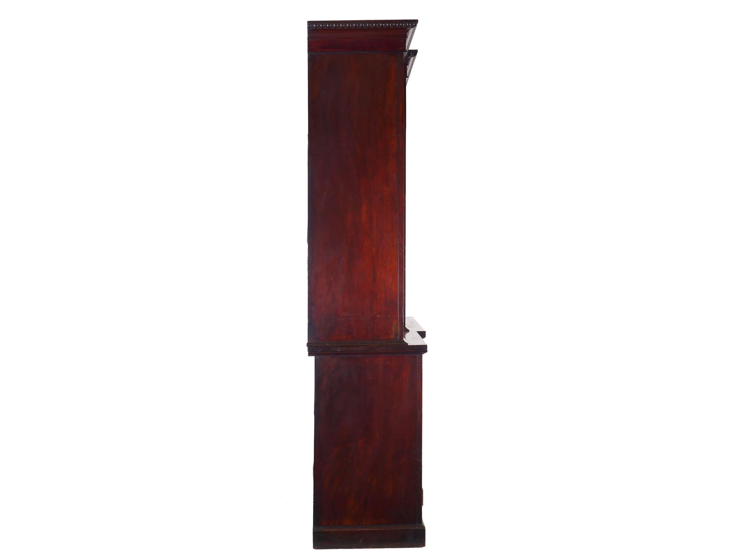 A rich and vibrant library bookcase from the second quarter of the 19th century, it is difficult for pictures to capture just how attractive the mahogany is throughout the case. It retains an early cognac finish under shellac that simply glows, the