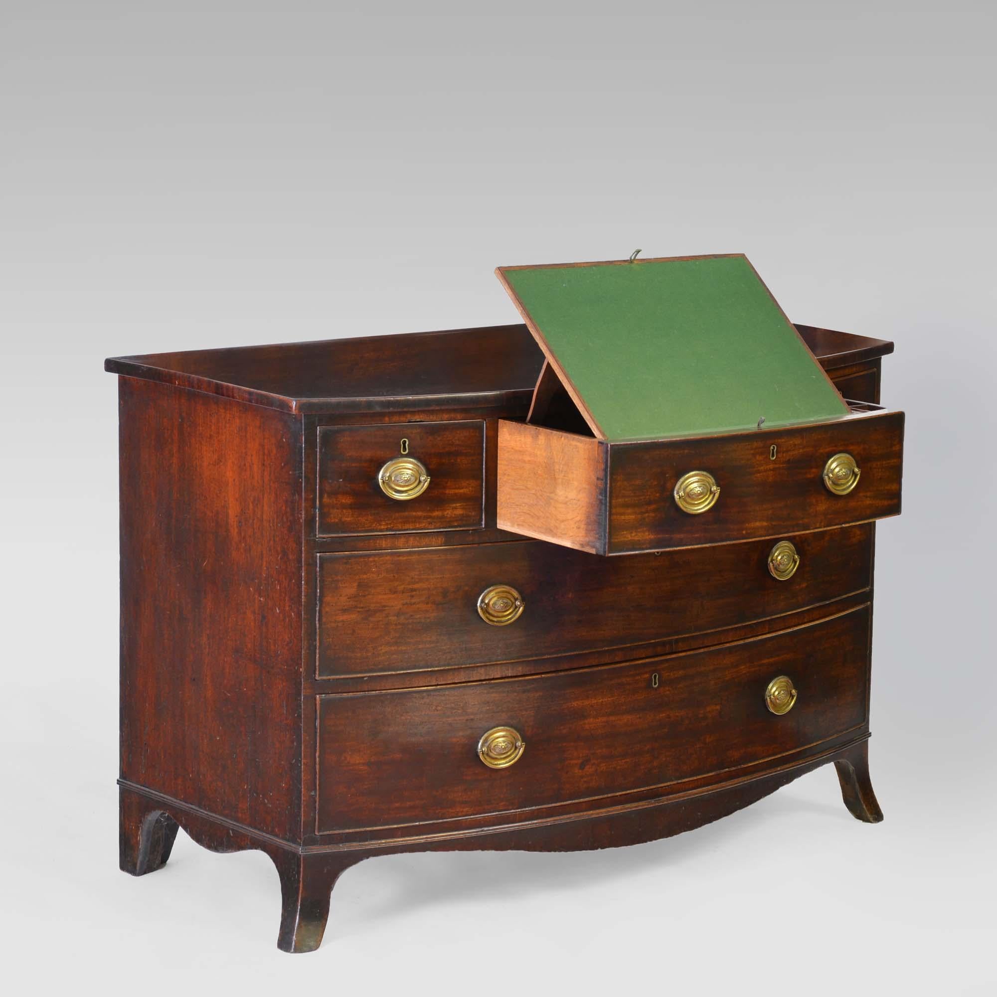 English Georgian mahogany bowfront commode chest of drawers with writing slide For Sale