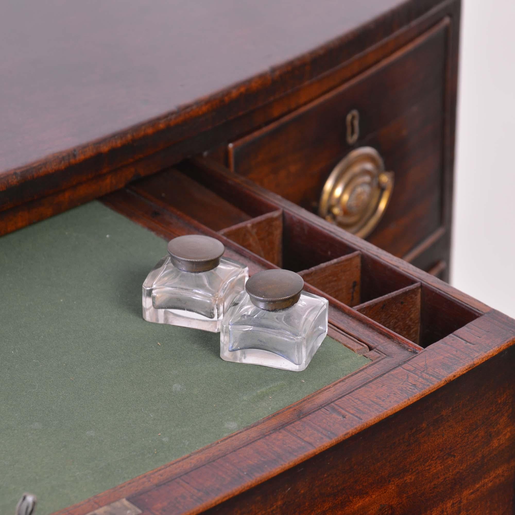 Mahogany Georgian mahogany bowfront commode chest of drawers with writing slide For Sale