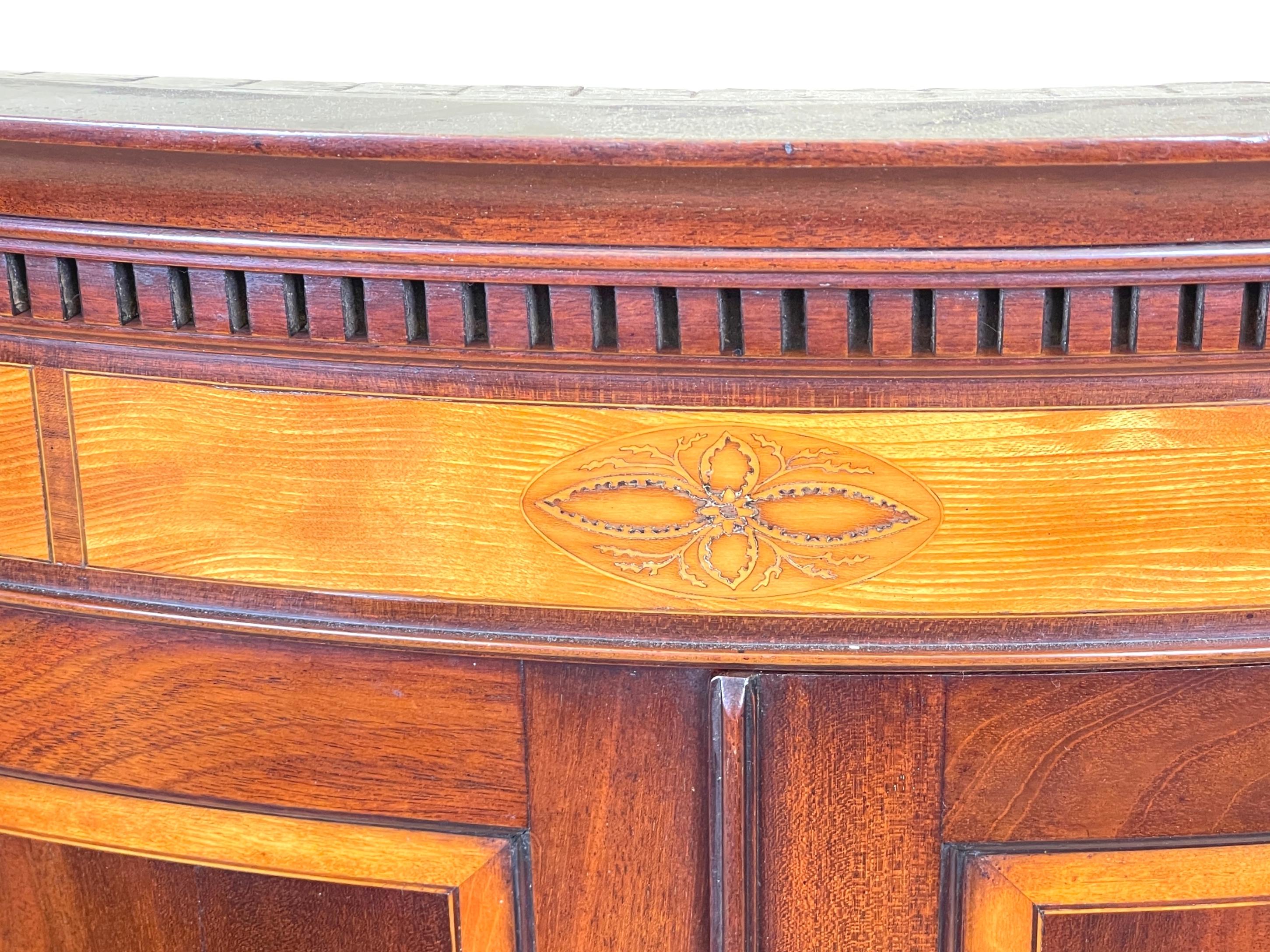 An Exceptional Quality Late 18th Century, Georgian Mahogany Hanging Corner Cupboard, Of Bowfronted Form, Having Satinwood Crossbanded And Inlaid Decoration To Panelled Doors, Enclosing Three Shelves.


Corner cupboards, particularly hanging ones,