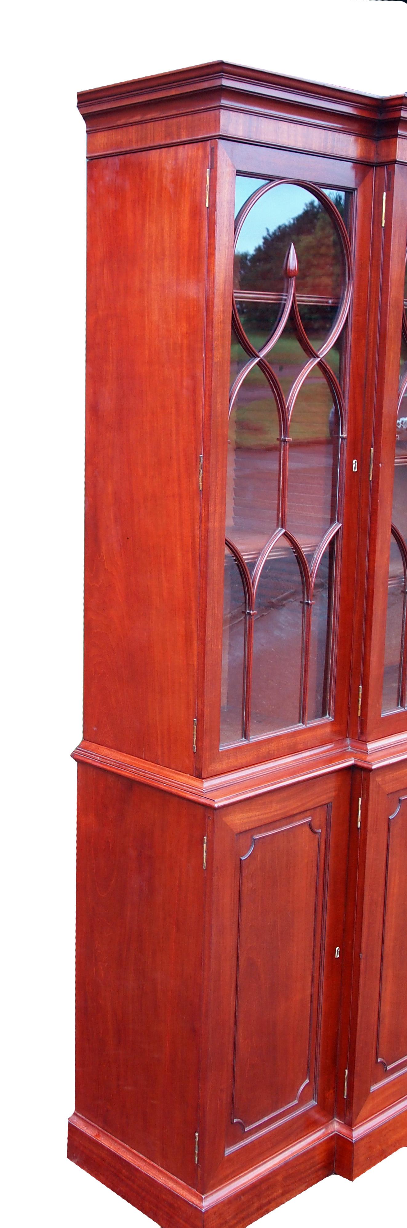 A superb quality George III period mahogany library
Bookcase of breakfront form, boasting charming small
Proportions, and four astragal glazed doors to top
Enclosing adjustable shelves over panelled cupboard
Doors enclosing further adjustable