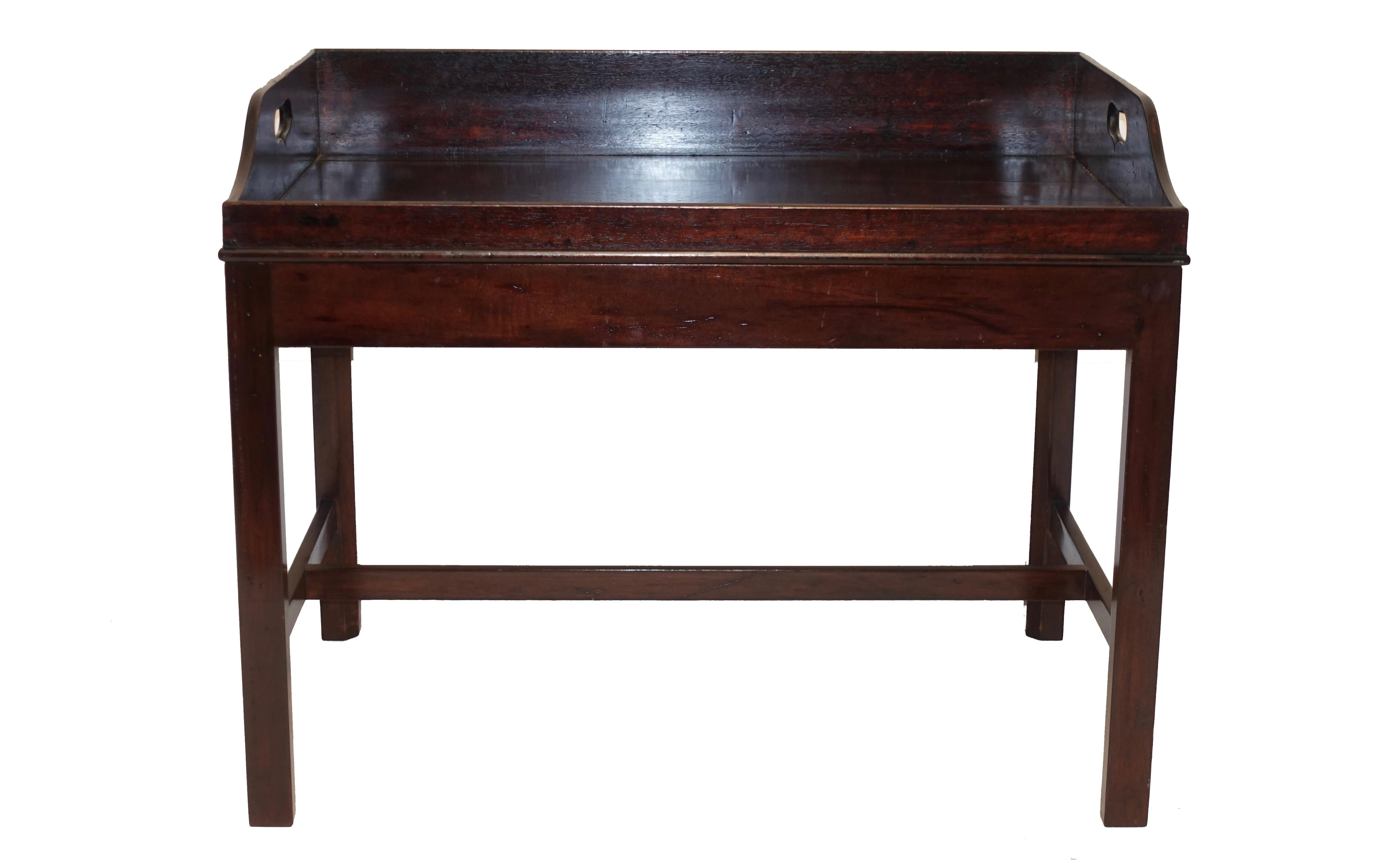 Georgian mahogany butlers tray on later made mahogany stand, England, mid-19th century.