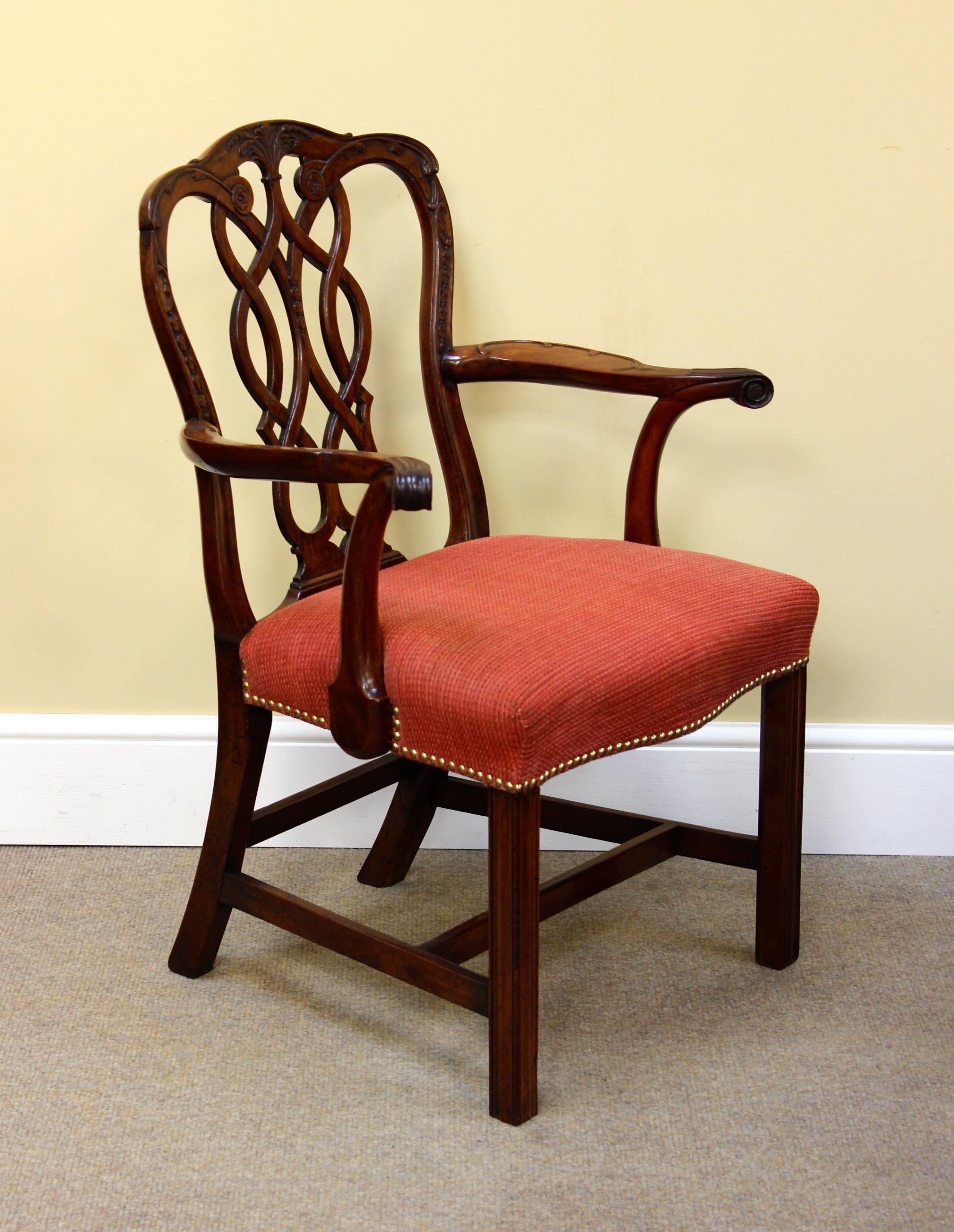 5928
Georgian Mahogany Carver Chair
With fine carving on arms & back,
Carved reeded front legs, upholstered seat
With brass studs.

26”w x 38”h x 19.5”d
66cm w x 96cm h x 50cm d

Items can be delivered by independent carrier but please note NOT all