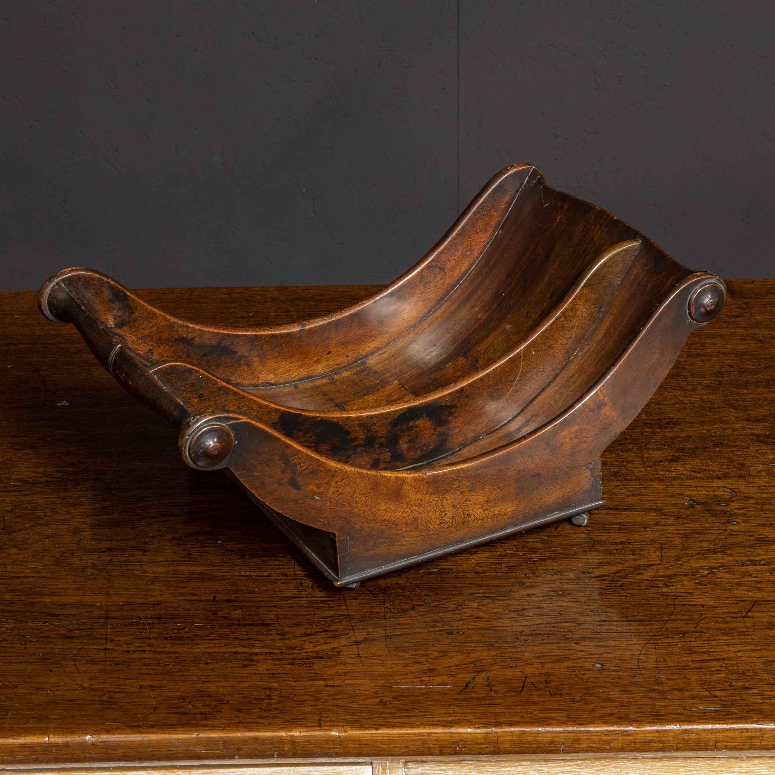 A Georgian mahogany cheese coaster from the late 18th century. With only a few small patch repairs to the bottom of the large division this piece is in wonderful condition complete with the original tiny castors. Always popular and ready to use or
