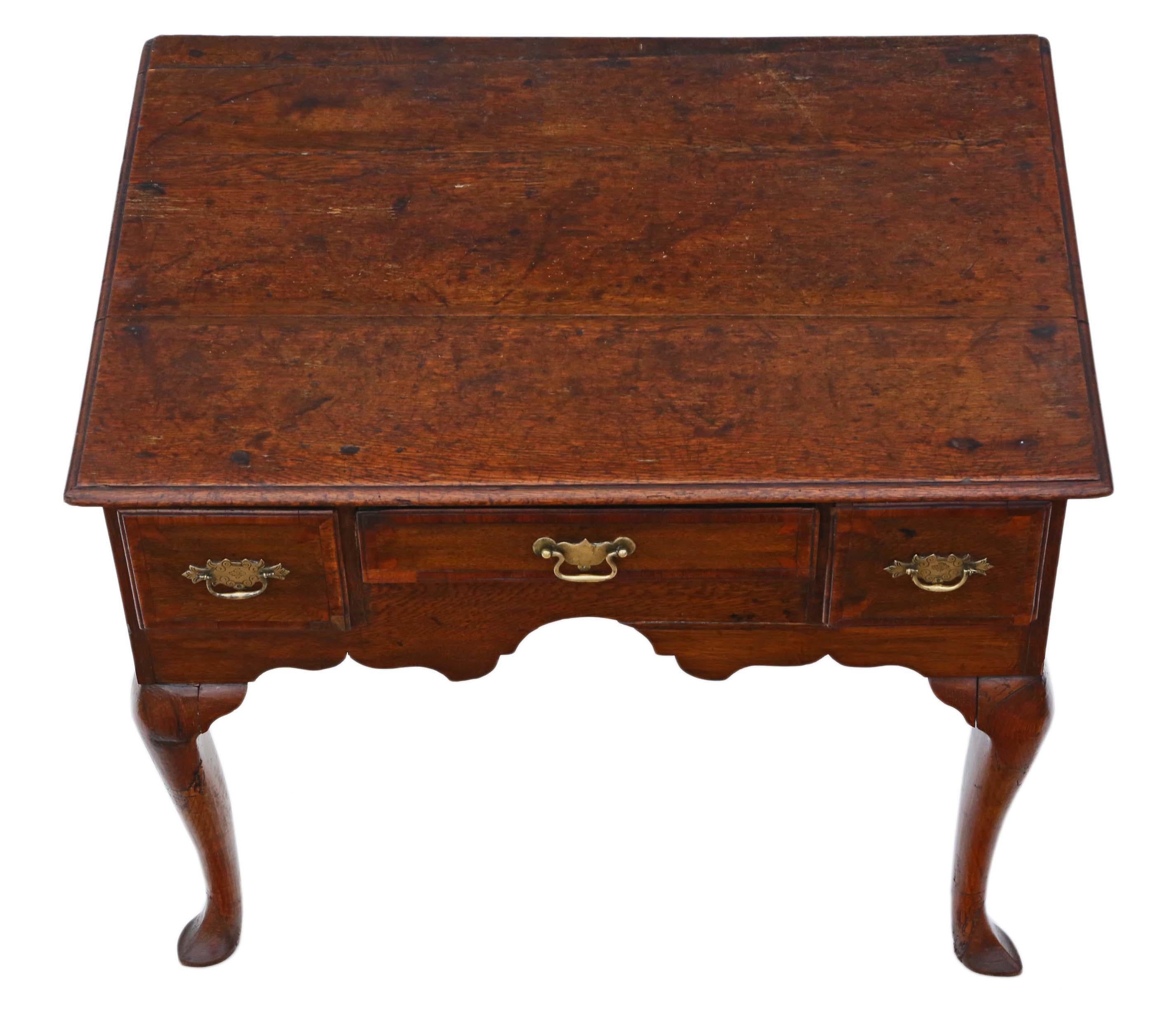 Antique Georgian mahogany crossbanded oak lowboy side table, circa 1760.
No loose joints. Full of age, character and charm. The drawers slide freely.
Would look great in the right location! A charming, characterful piece.
Overall maximum