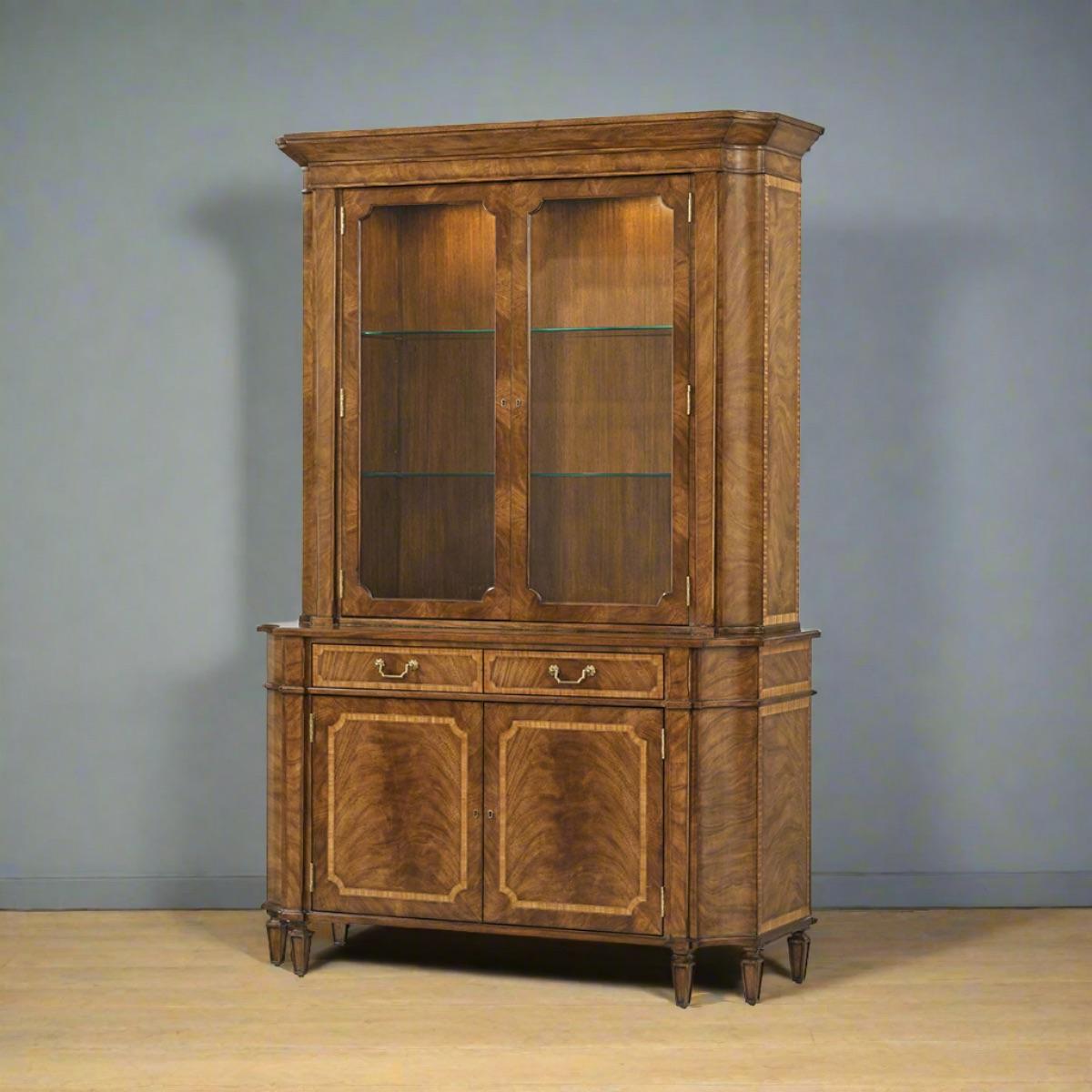 Crafted from premium figured wood, this cabinet showcases rich, warm tones and intricate grain patterns that exude luxury. The upper section features two spacious glass shelves, perfect for displaying your finest china, collectibles, or treasured