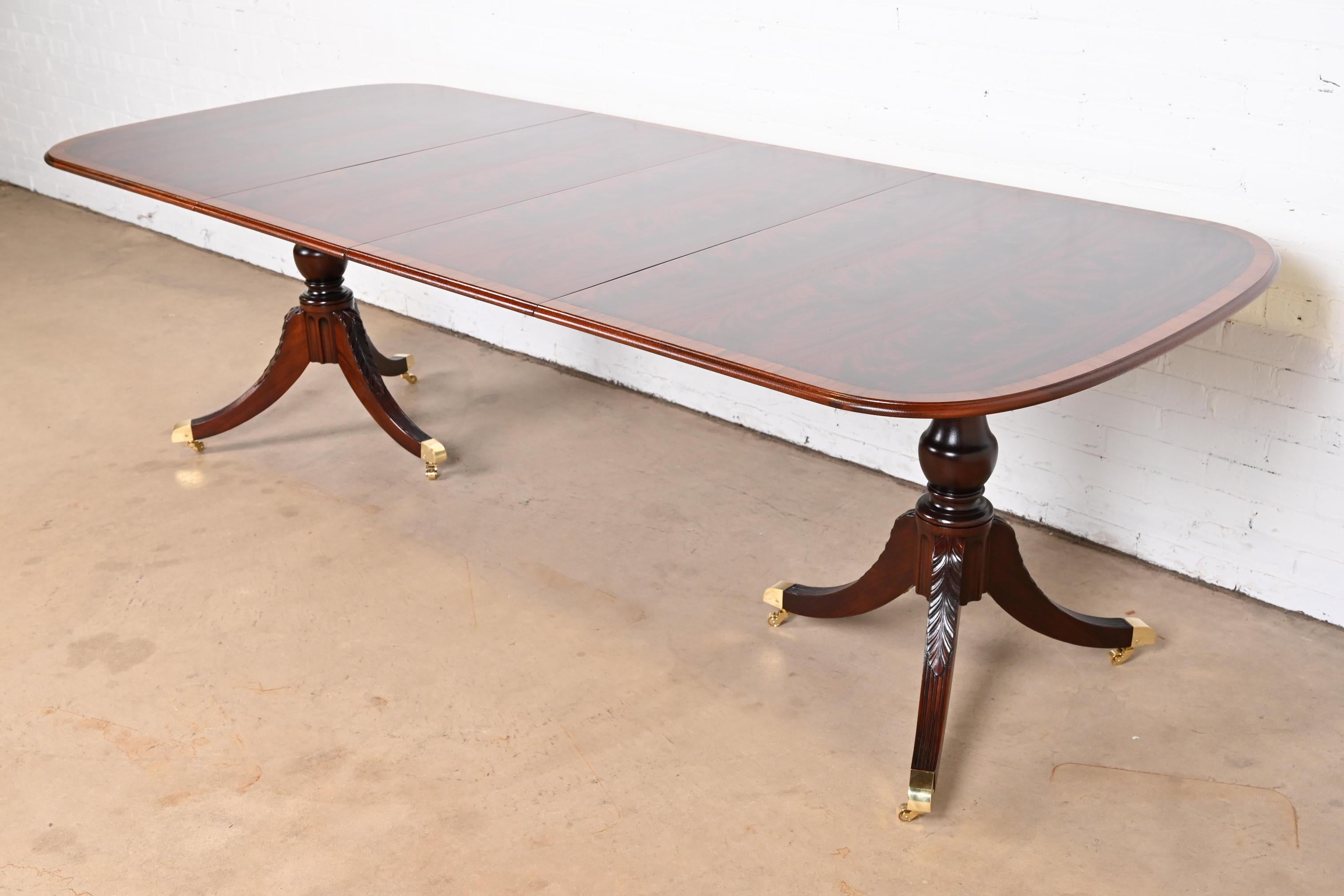 20th Century Georgian Mahogany Double Pedestal Dining Table in the Manner of Baker Furniture