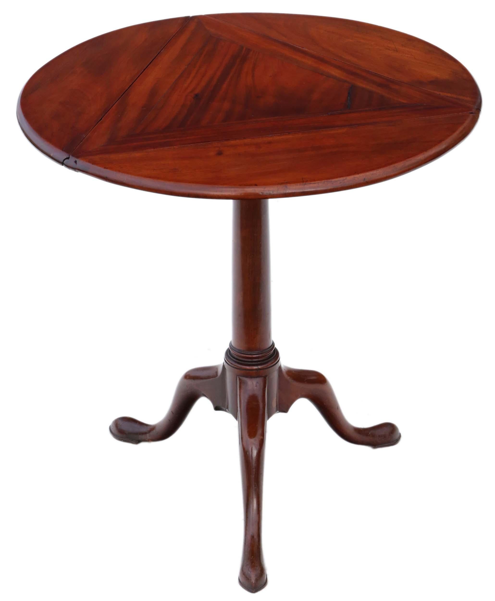 Antique Georgian mahogany folding wine side or supper table, circa 1820. A rare quality item.
Solid with no loose joints. A charming table that is full of age, character and charm.
A very rare and unusual find with a lovely tapered gun barrel