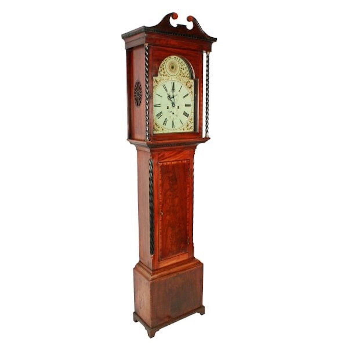 Georgian Mahogany Grandfather clock

An early 19th century Scottish Georgian mahogany Grandfather clock.

The clock has an eight day double weighted works that strike the hour on a bell.

The white painted dial is decorated with flowers and