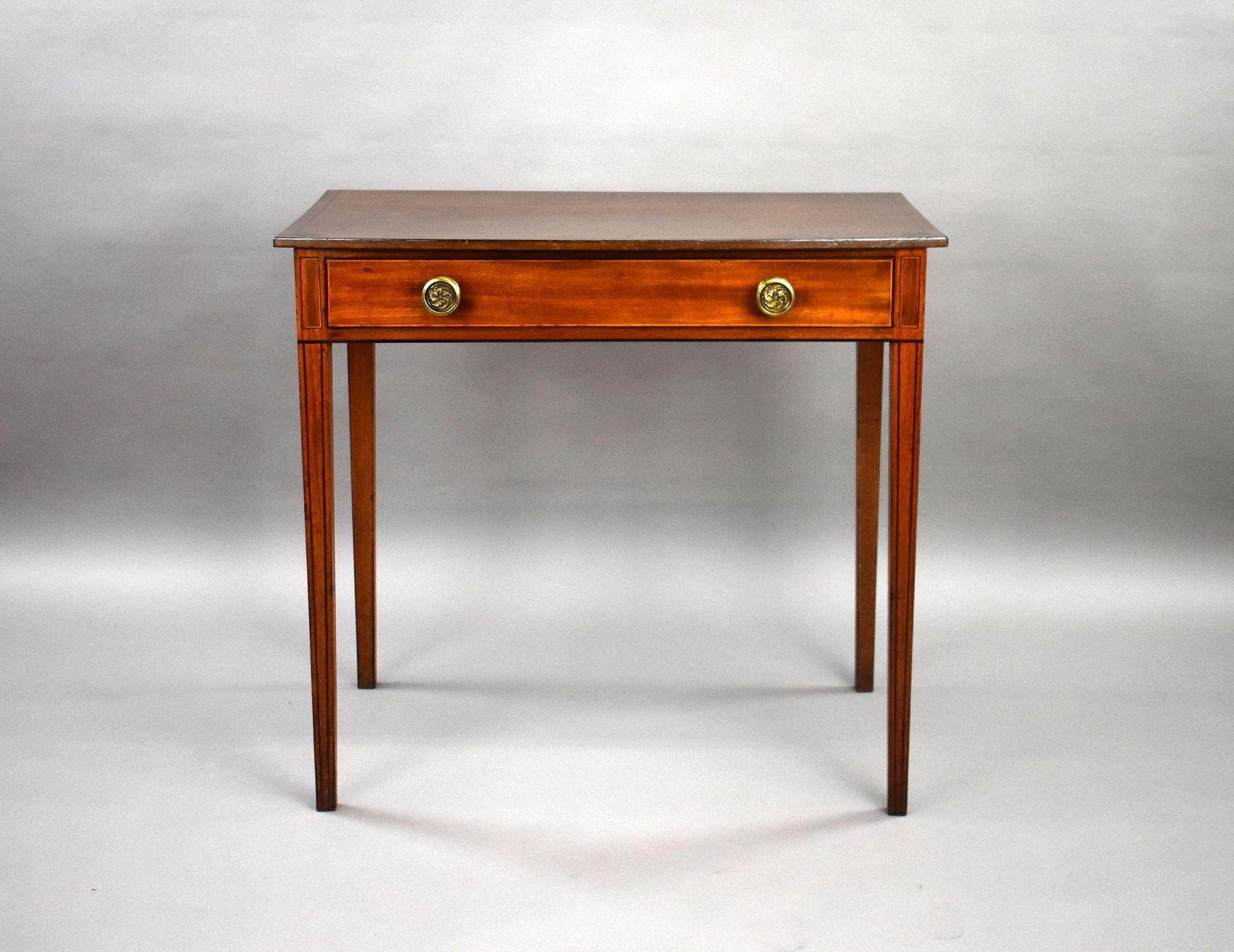 Georgian Mahogany Hall Table
Item Code: LC1375
A charming Georgian mahogany hall table of elegant proportions, featuring a single full-width drawer with brass roundel handles. The table stands on square tapering legs with string inlay decoration,
