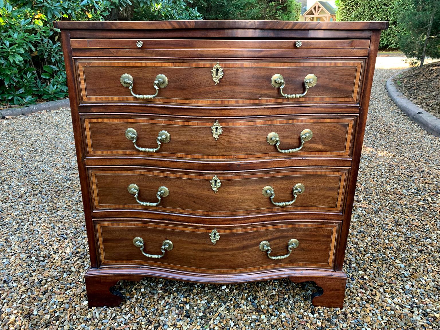 19th Century Georgian Mahogany Inlaid Serpentine Chest of Drawers For Sale