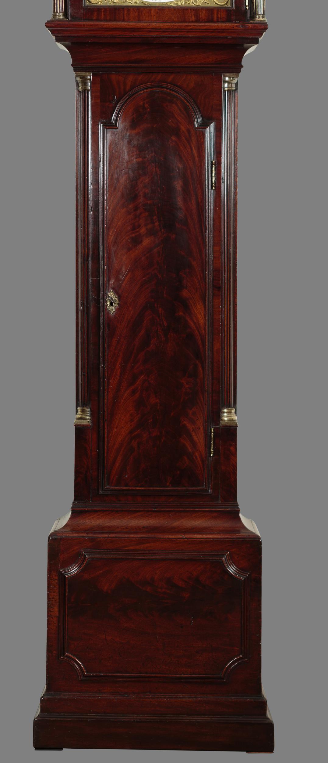 Georgian longcase clock by George Tupman, London

Georgian longcase clock in a finely figured mahogany case with stepped base, raised moulding to the plinth, long break arch door with brass escutcheon and reeded canted corners to either side with