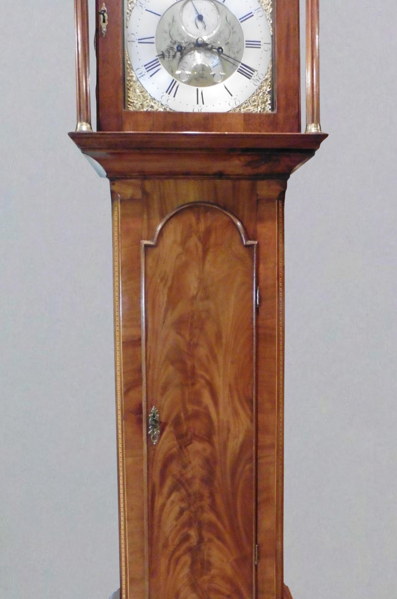 Georgian mahogany longcase clock by Stephen Mears, Hempnall




Finely figured mahogany case with long break arch trunk door with canted corners inlaid with boxwood and satinwood. Break arch hood with typical East Anglian ‘Wales Tails’ pediment