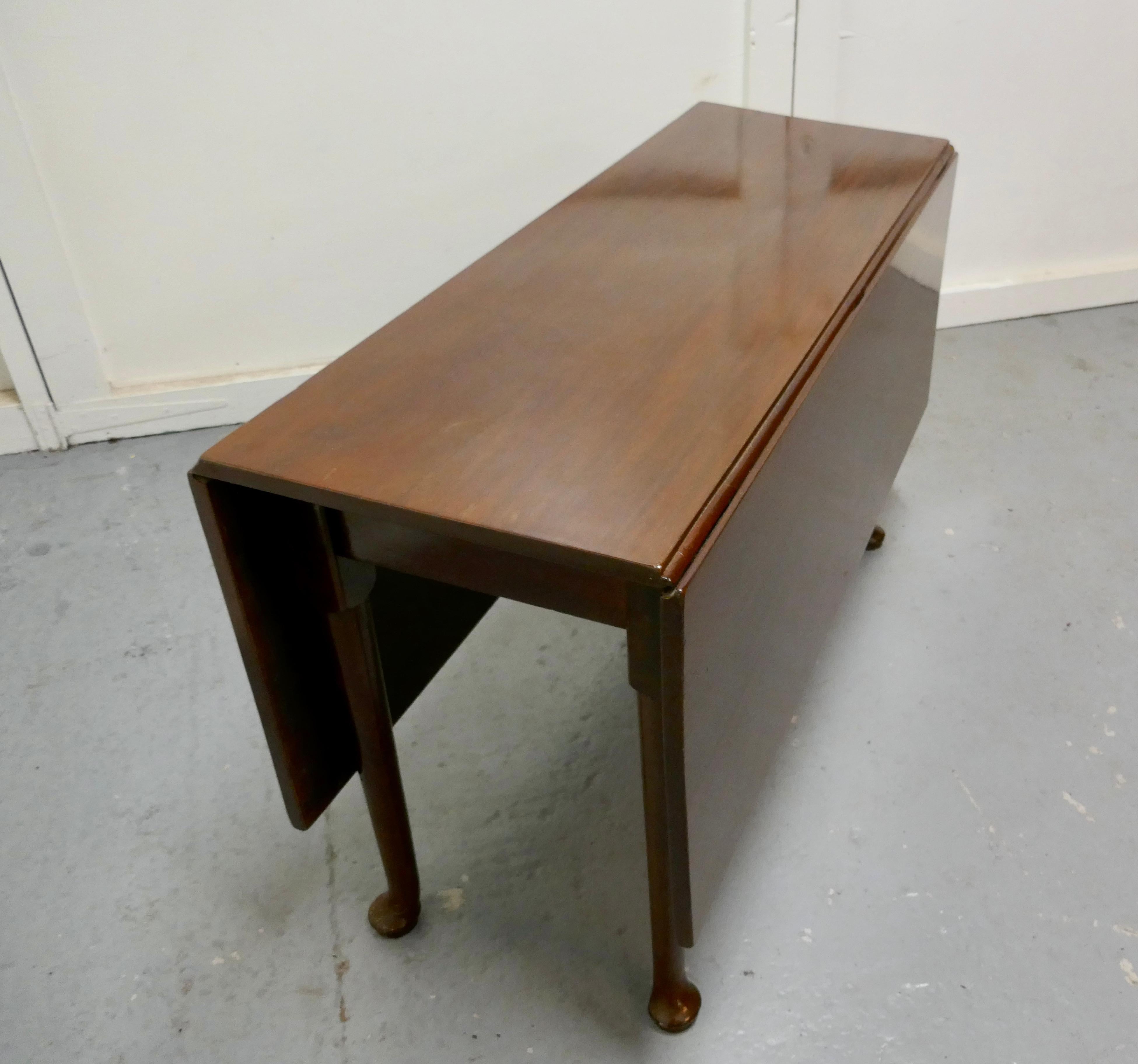 Georgian mahogany pad foot drop-leaf cottage diner, 

Georgian mahogany drop leaf dining table. 
This type of table is often know as cottage diner because it is space saving with the leaves down and opens to a large dining table when needed