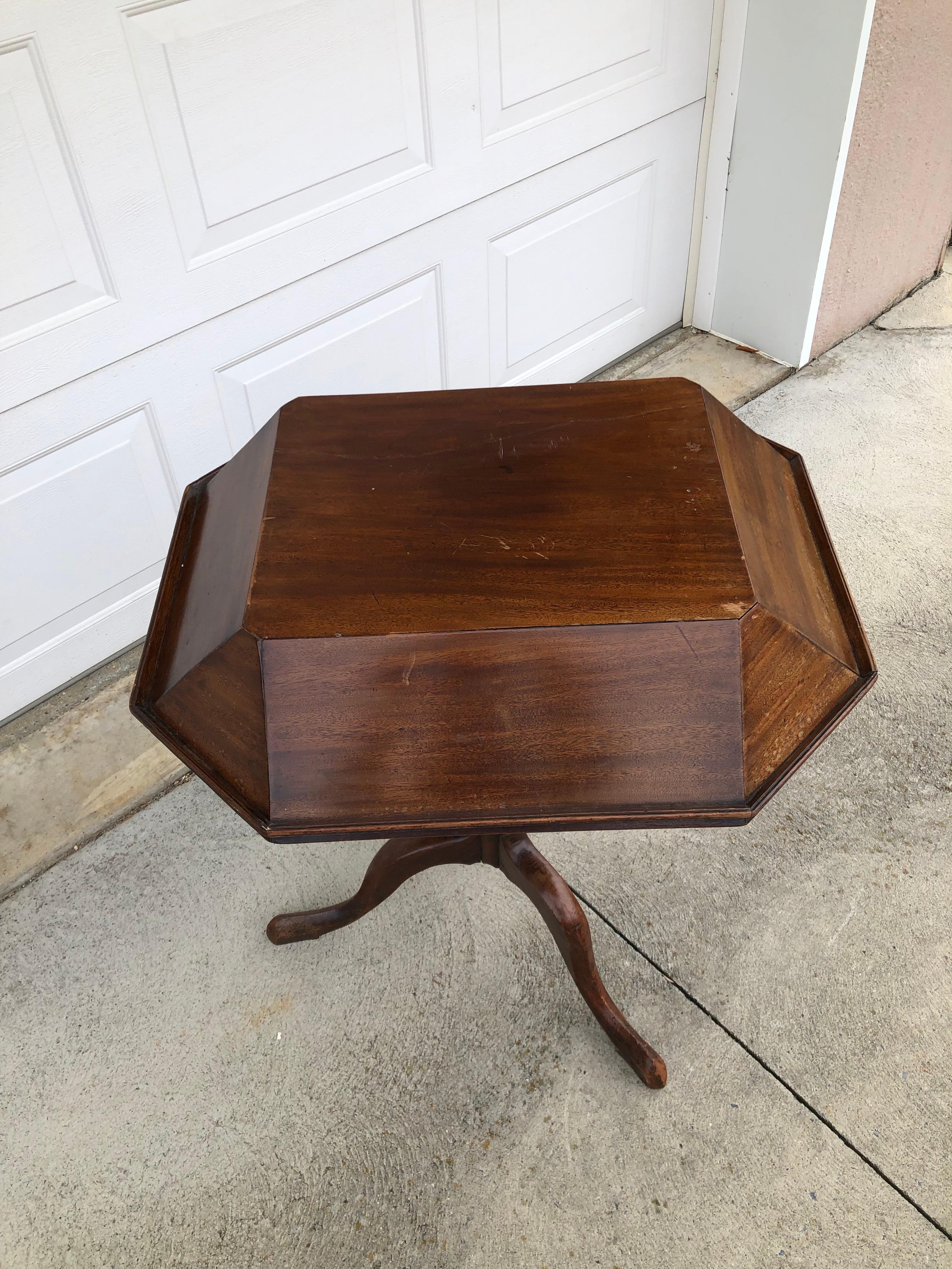 Georgian mahogany Queen Ann music stand with carved snake feet.