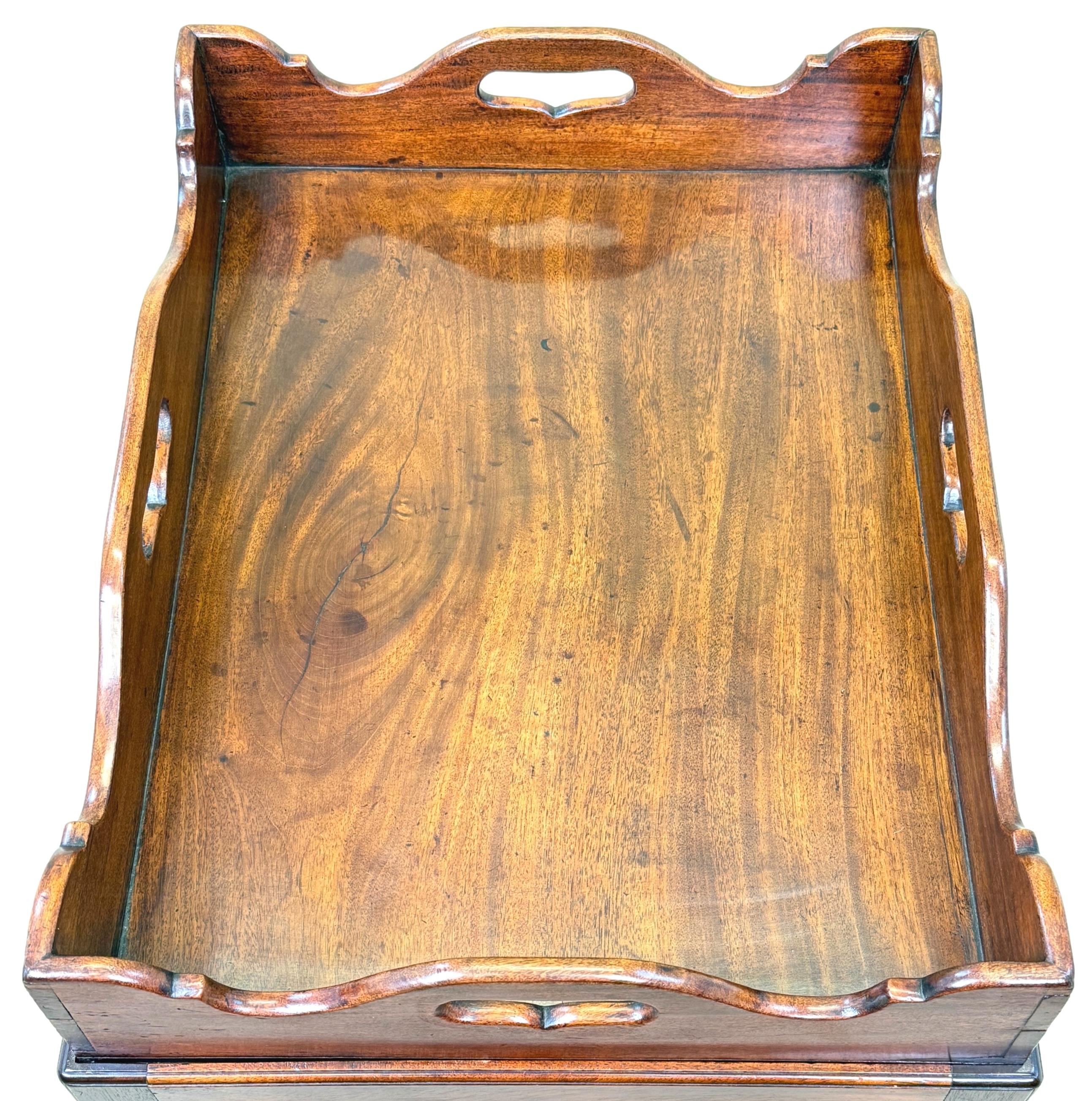 A Superbly Figured And Good Quality George III Period Mahogany Rectangular Butlers Tray, Having Attractively Shaped Sides With Elegant Pierced Carrying Handles, Raised On Square Chamfered Leg Mahogany Stand Constructed From 18th Century