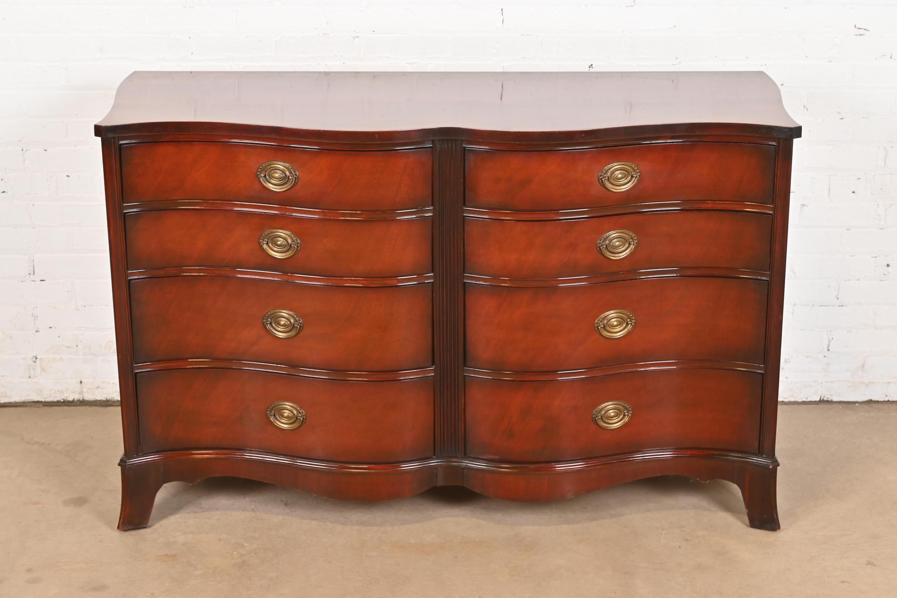 American Georgian Mahogany Serpentine Front Eight Drawer Dresser by White Furniture For Sale