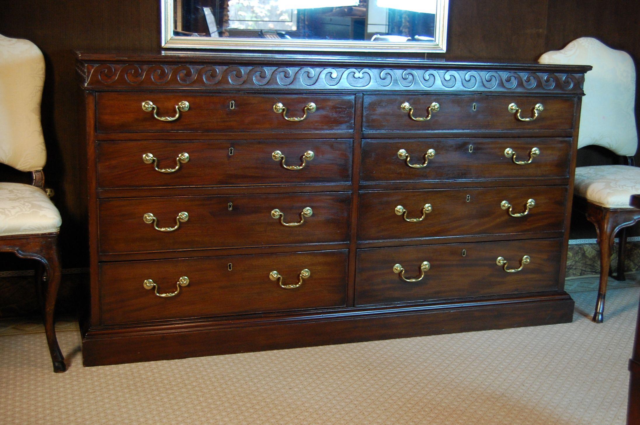 Handsome English Georgian mahogany sideboard with 8 drawers, each drawer is lined in either Pacific cloth, which prevents tarnishing of silver items, or in a blue cotton print. Three drawers have flatware dividers, late 18th-early 19th century.