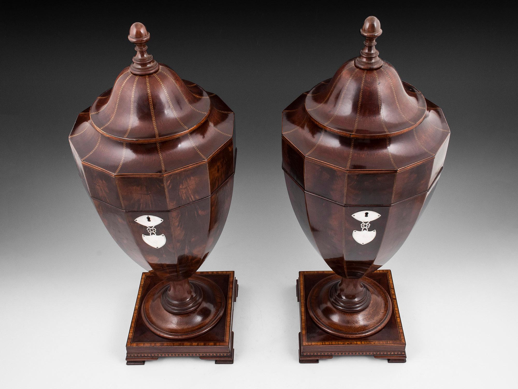 Fine & Rare Pair of Mahogany Spoon Urns 

From our boxes collection, we are delighted to offer this extremely good and rare pair of Georgian cutlery urns. The urns made specifically for spoons are veneered in flame Mahogany separated with