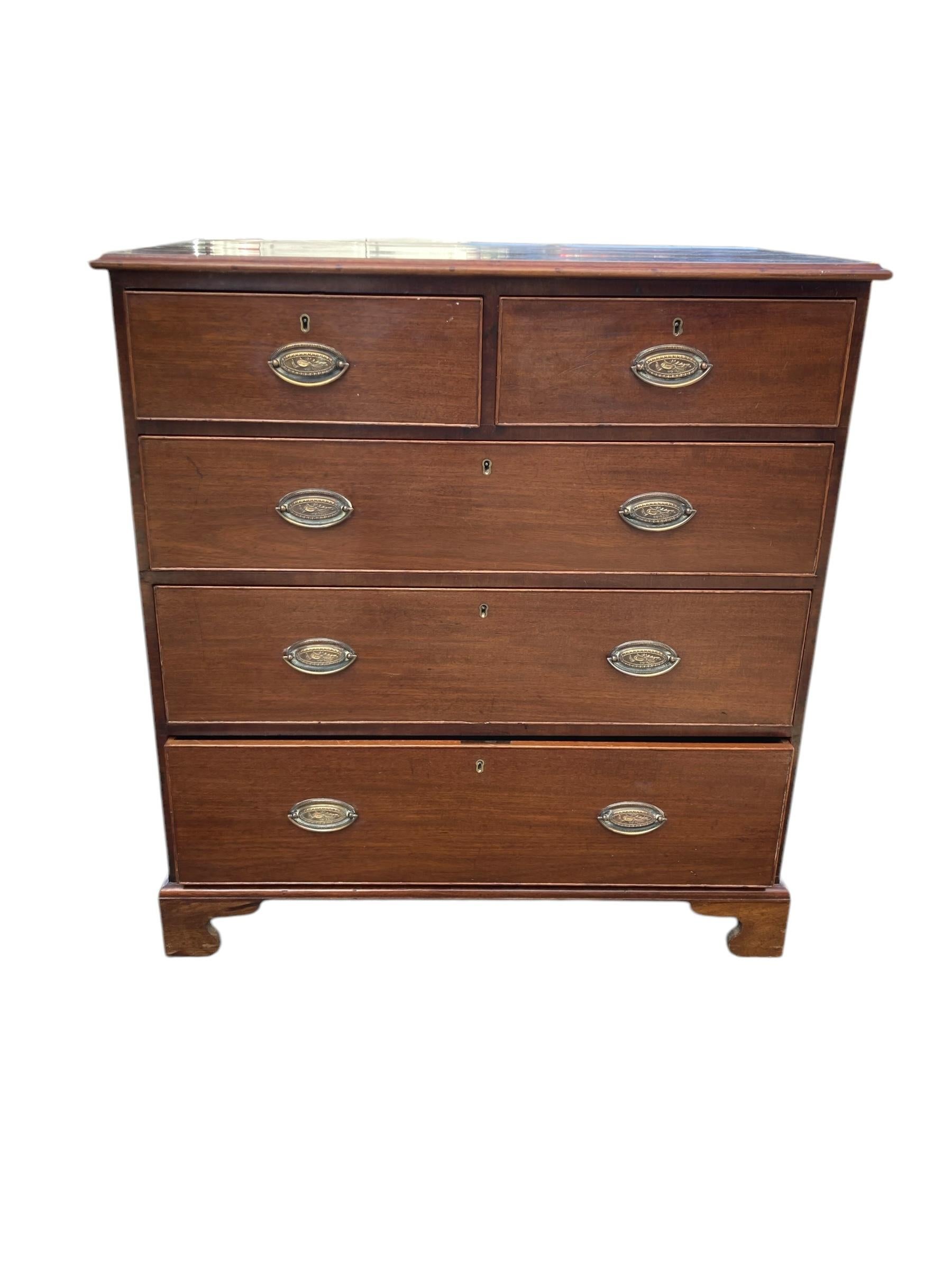 Georgian Mahogany Two over three Five drawer Chest. Late 18th Century George III, graduated drawers. Overall good condition some surface scratches to the top inline with its age, very solid structurely. Classic oval shaped handles sitting on bracket