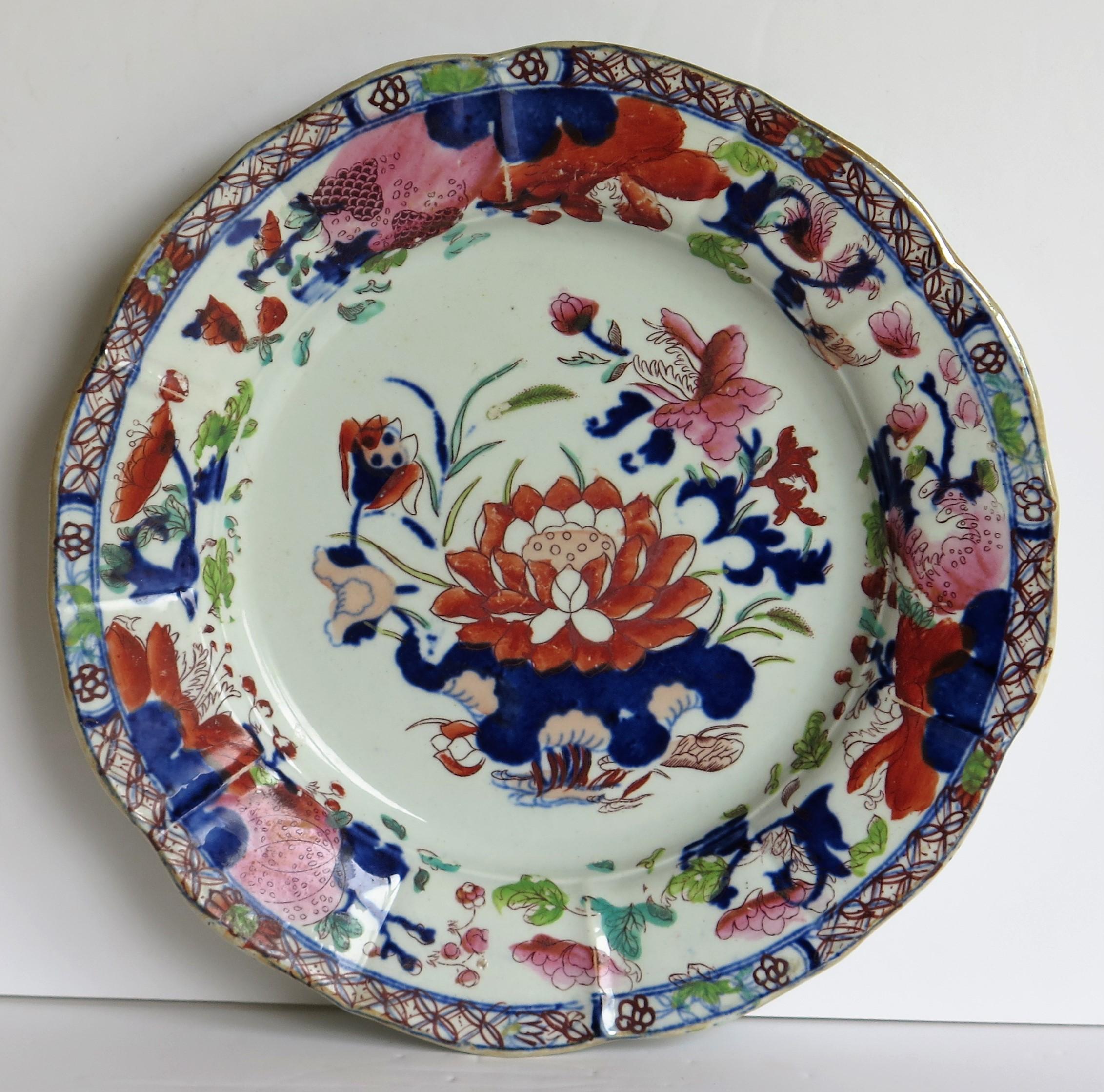 This is a very good early Mason's Ironstone pottery deep plate or dish in the very decorative Water Lily pattern, produced by the Mason's factory at Lane Delph, Staffordshire, England, circa 1813-1820.

The plate is circular with radial ribs and a