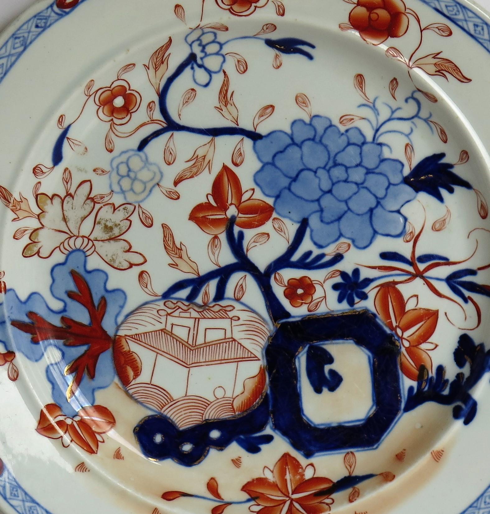 This is a good early Mason's Ironstone pottery dinner plate, hand painted in the very decorative Jardiniere pattern, produced by the Mason's factory at Lane Delph, Staffordshire, England, in the George 111rd period, circa 1813-1820.

The plate is