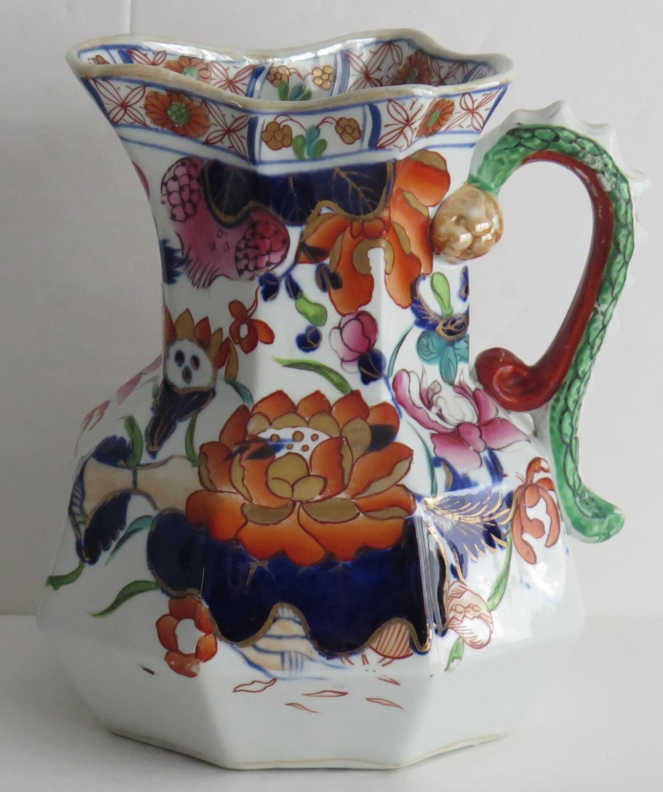 This is a beautiful, early jug or pitcher in the highly collected Water Lily pattern, made by Mason's Ironstone, England, circa 1817.

The jug has the Hydra shape with the snake heads handle with lower spur. 

This jug has one of the highly