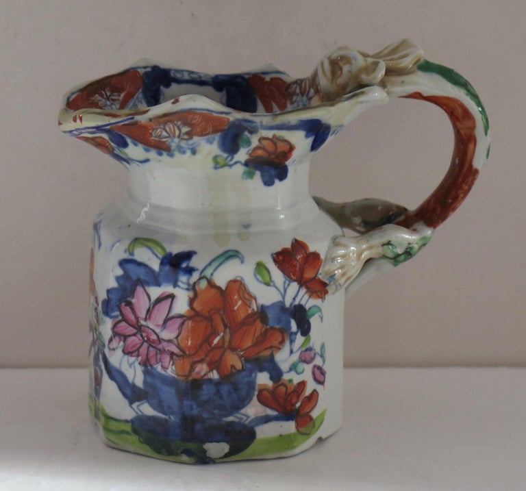 This is a fine and rare, ironstone pottery small jug or creamer in the Vase and Jardiniere pattern, made by Mason's Ironstone, of Lane Delph, Staffordshire, England, in the George 111rd period, circa 1813 to 1820.

The jug is octagonal in form