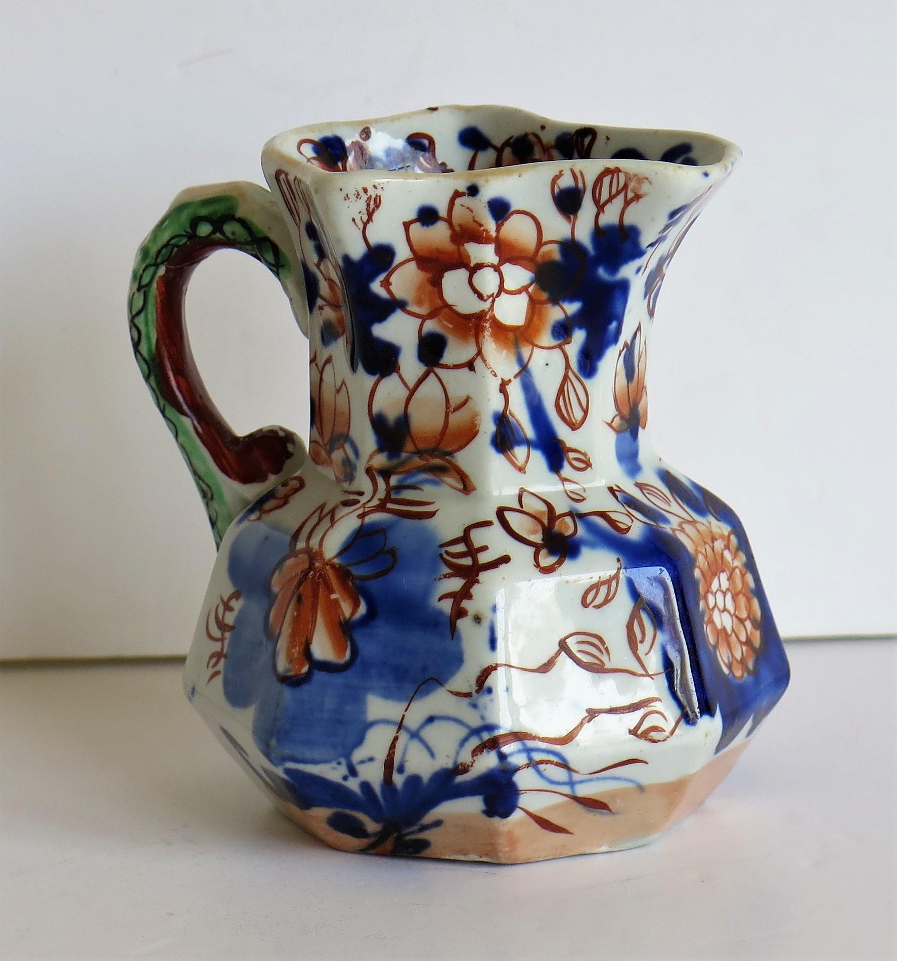 This is a good, very early Mason's ironstone Hydra jug, hand painted in the Japan basket pattern, circa 1813-1815, which is the late George 111rd period.

The jug has an octagonal shape with a notched snake handle and is hand decorated in the