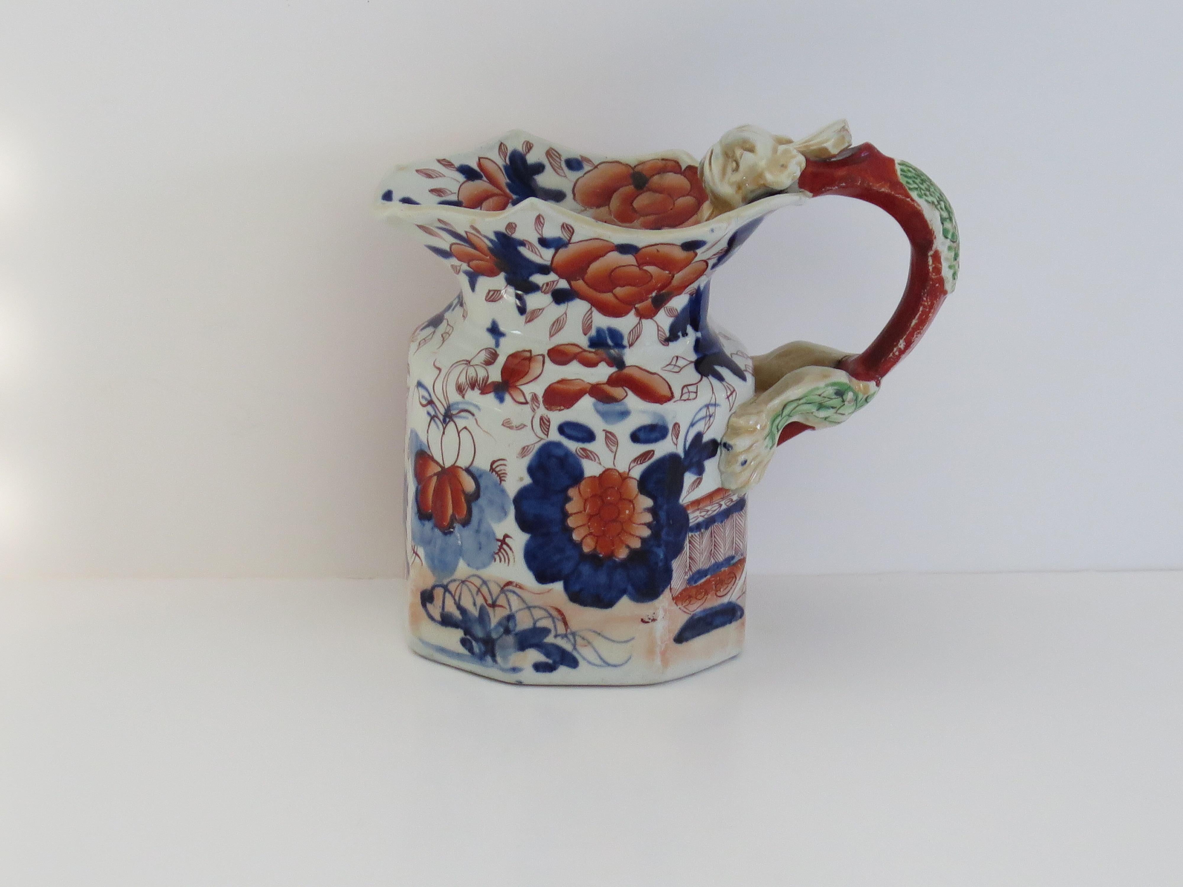 This is an early, decorative Mason's Ironstone Jug or pitcher, made at their Lane Delph factory, Staffordshire Potteries, England, in the early 19th century, George 111rd period, circa 1820.

This jug has the 