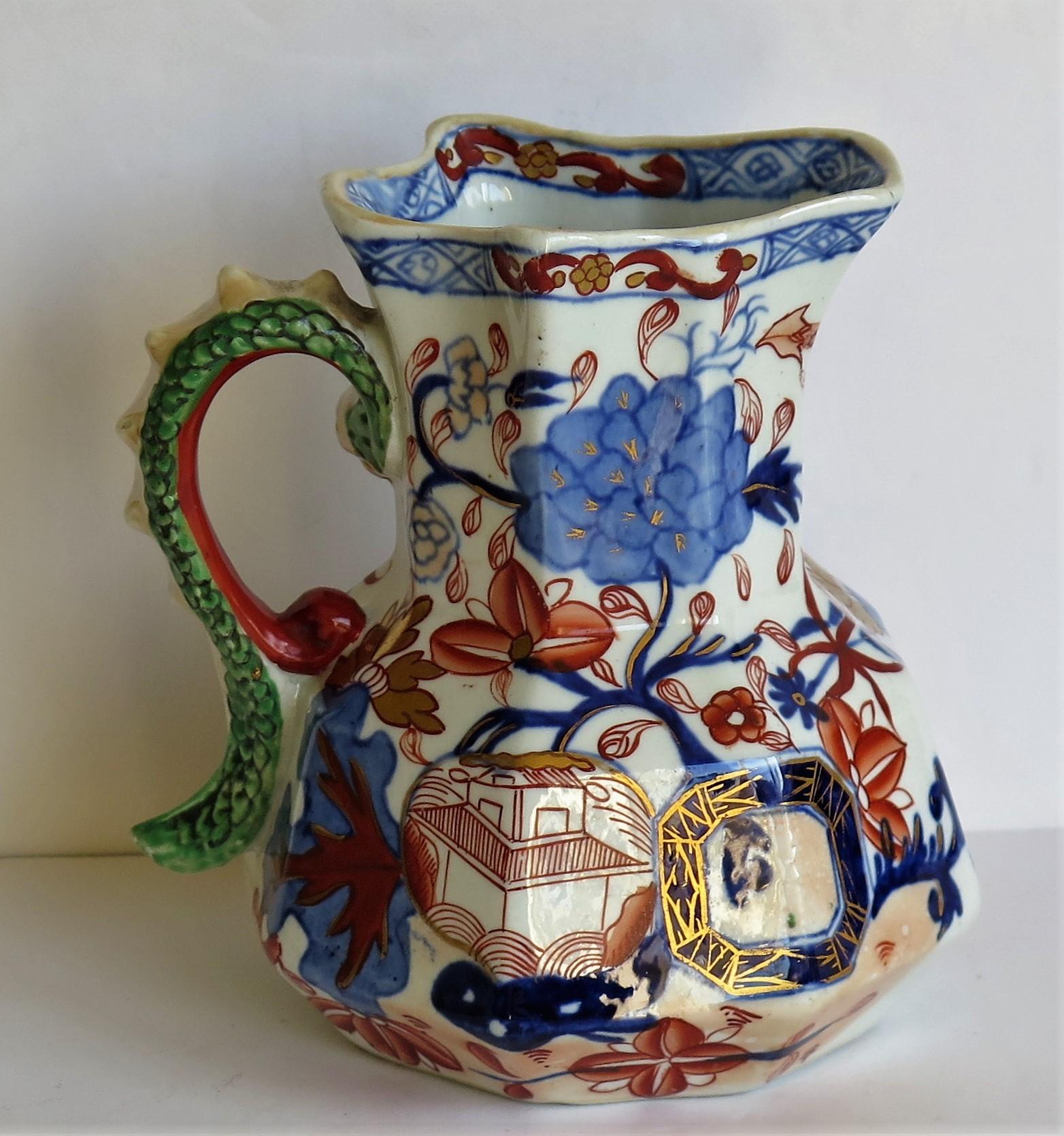 This is a very good, very early Mason's Ironstone Hydra jug or pitcher in the gilded jardinière pattern, dating to the late George 111rd period, circa 1813-1815. 

The jug has an octagonal hydra shape with a notched snake handle and is hand