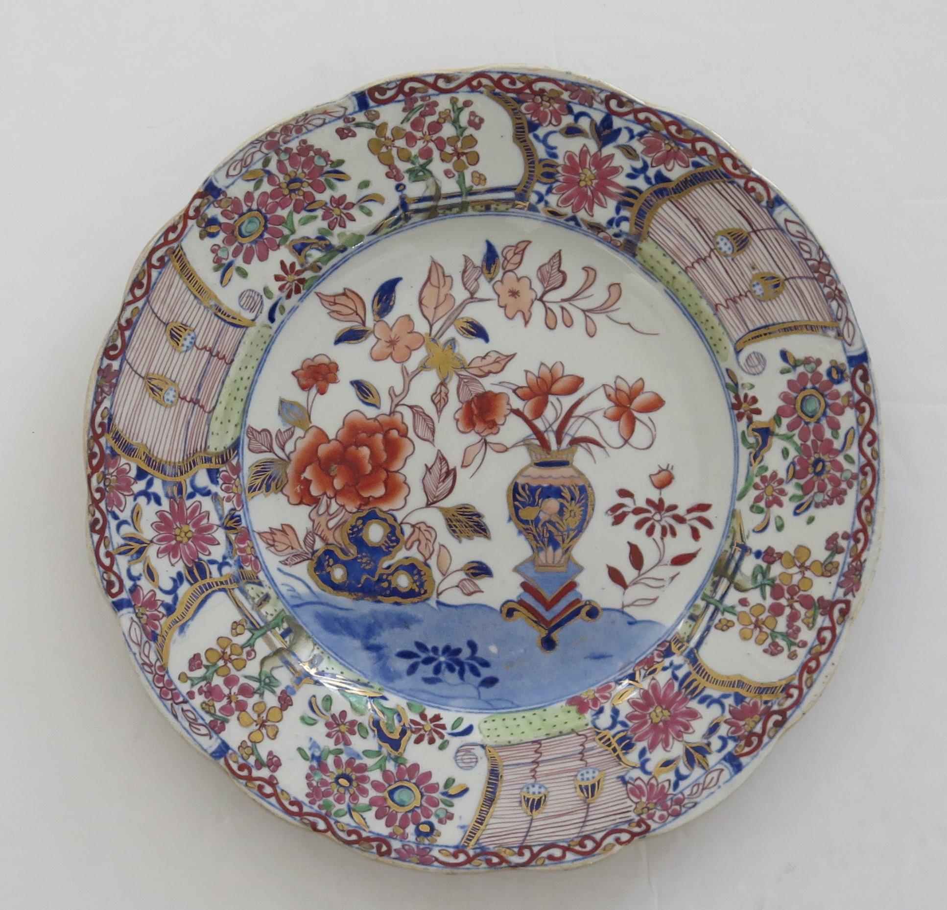 This is a very decorative ironstone pottery Plate produced by the Mason's factory at Lane Delph, Staffordshire, England, circa 1818.

The plate is circular with a wavy indented edge.

This Plate is beautifully and elaborately decorated in one of