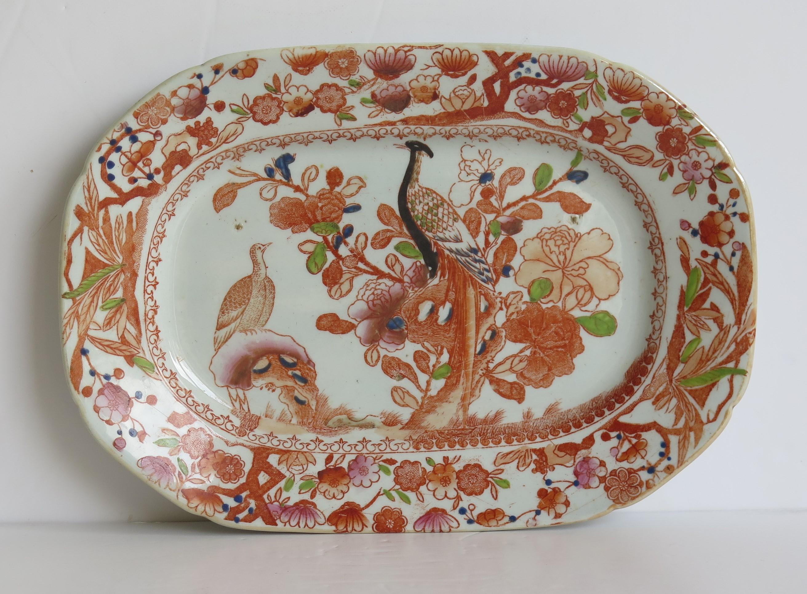 This a good early 19th century platter made by Mason's Ironstone in the Oriental Pheasant pattern, circa 1818.

Very early 19th century Mason's Ironstone platters are fairly rare and this is a good example in a very attractive burnt orange