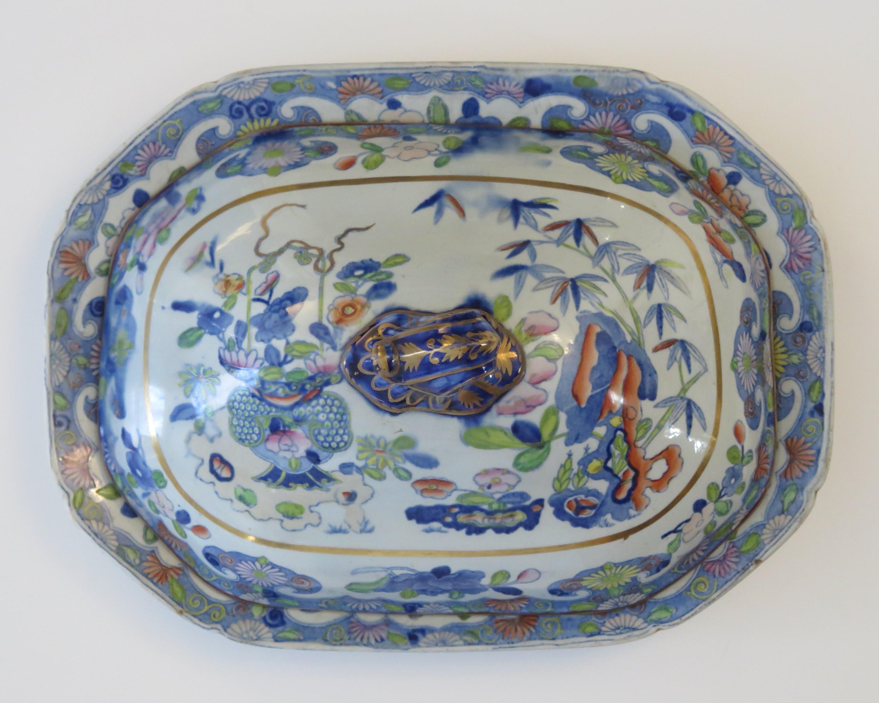 This is a very decorative ironstone serving dish or plate complete with lid or cover, made by Mason's of Lane Delph, Staffordshire, England, during the early part of the 19th century, circa 1820.

Both pieces are well potted. The plate or dish has