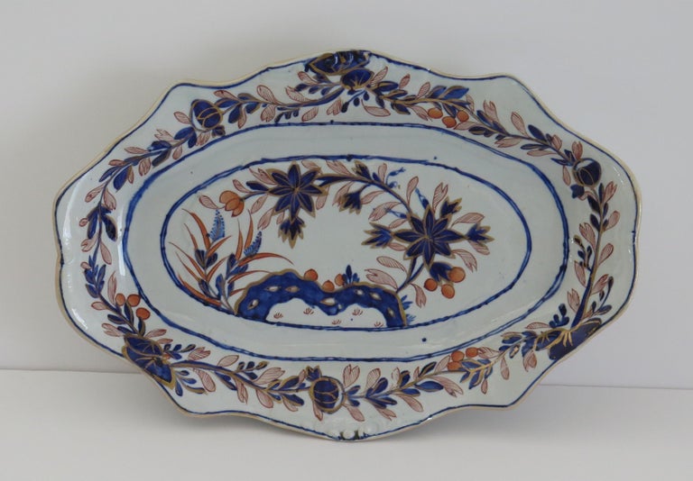 This is a very decorative oval shaped serving dish or platter by Mason's Ironstone, Lane Delph, England in the 