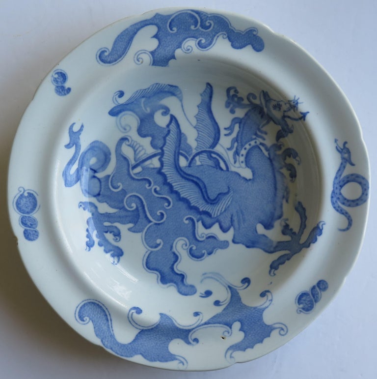 This is an early Mason's ironstone pottery soup bowl or plate in the rare blue and white Chinese Dragon pattern, circa 1818.

This bowl or plate is decorated in one of the rare patterns called 