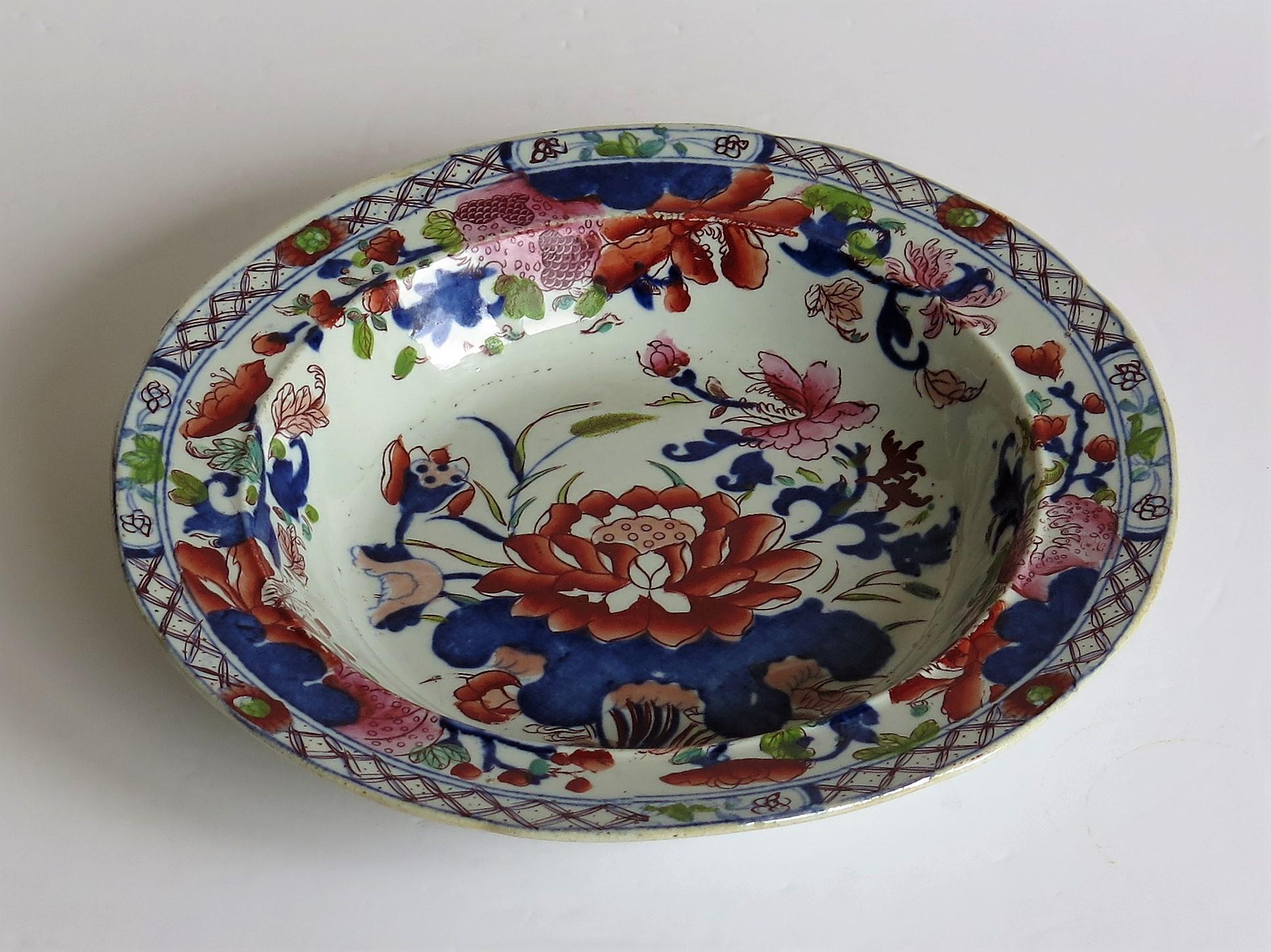 This is a very good early Mason's ironstone pottery soup bowl or deep plate hand painted in the very decorative Water Lily pattern, produced by the Mason's factory at Lane Delph, Staffordshire, England, circa 1813-1820.

The plate is circular with