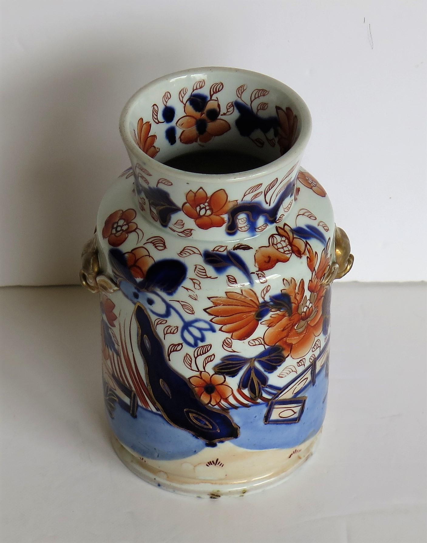 This is a rare ironstone vase or jar made by Mason's, Lane Delph, Staffordshire Potteries, England in its earliest period of Ironstone production, circa 1813-1815.

The vase is well potted, having a cylindrical body with a smaller diameter high